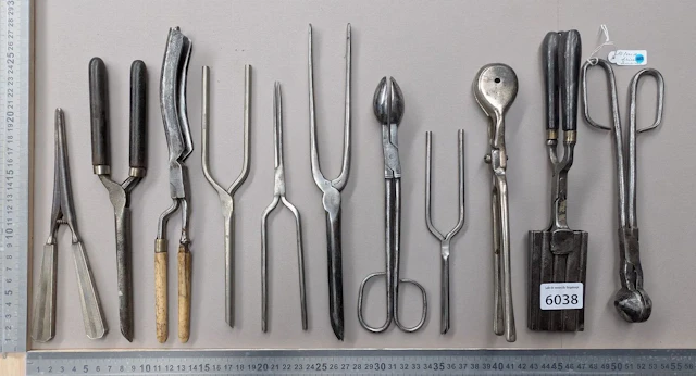 10 vintage curling irons—see photos for dimensions and condition