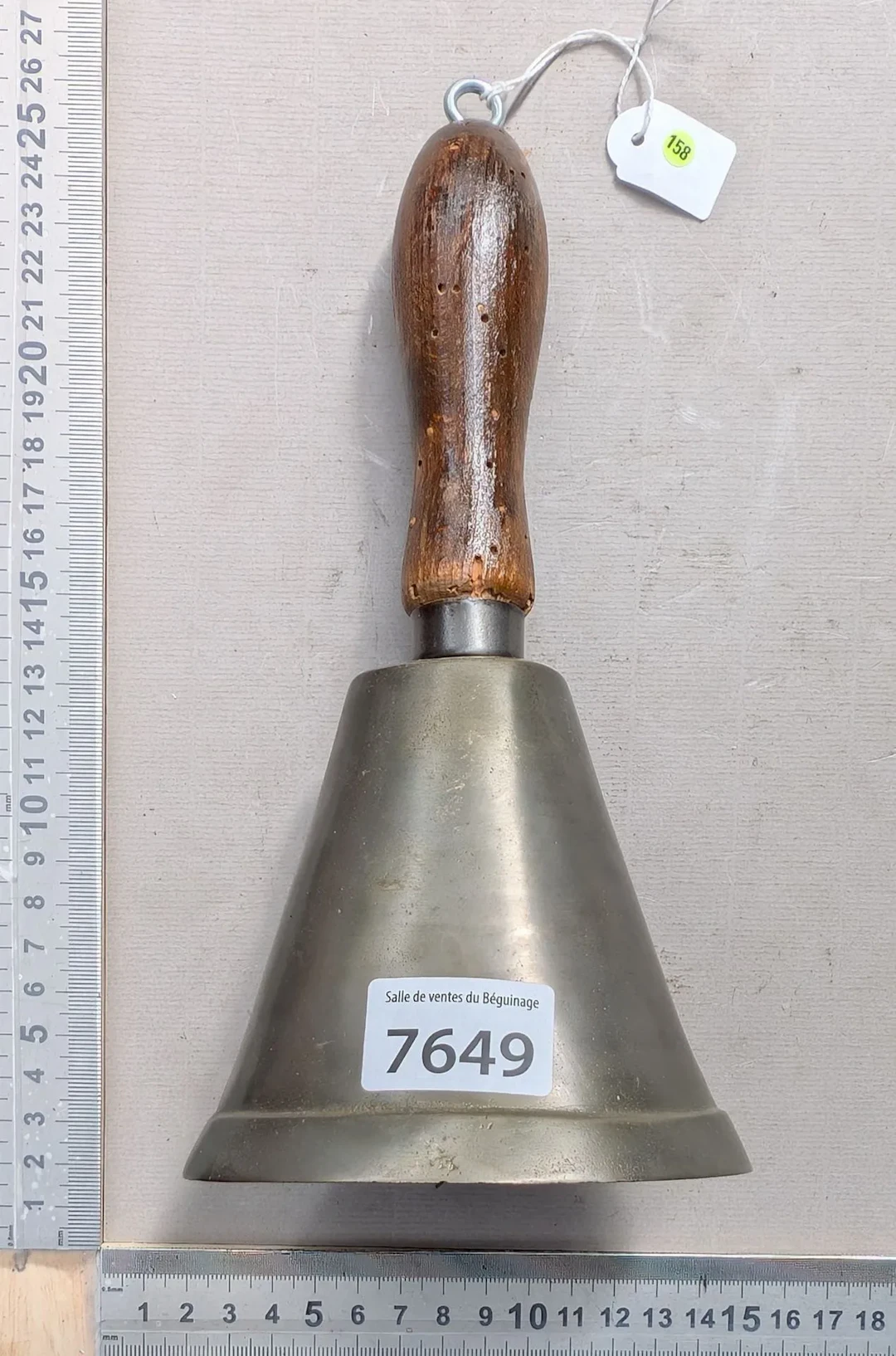 A very beautiful bronze bell with a wooden handle—see photos for dimensions