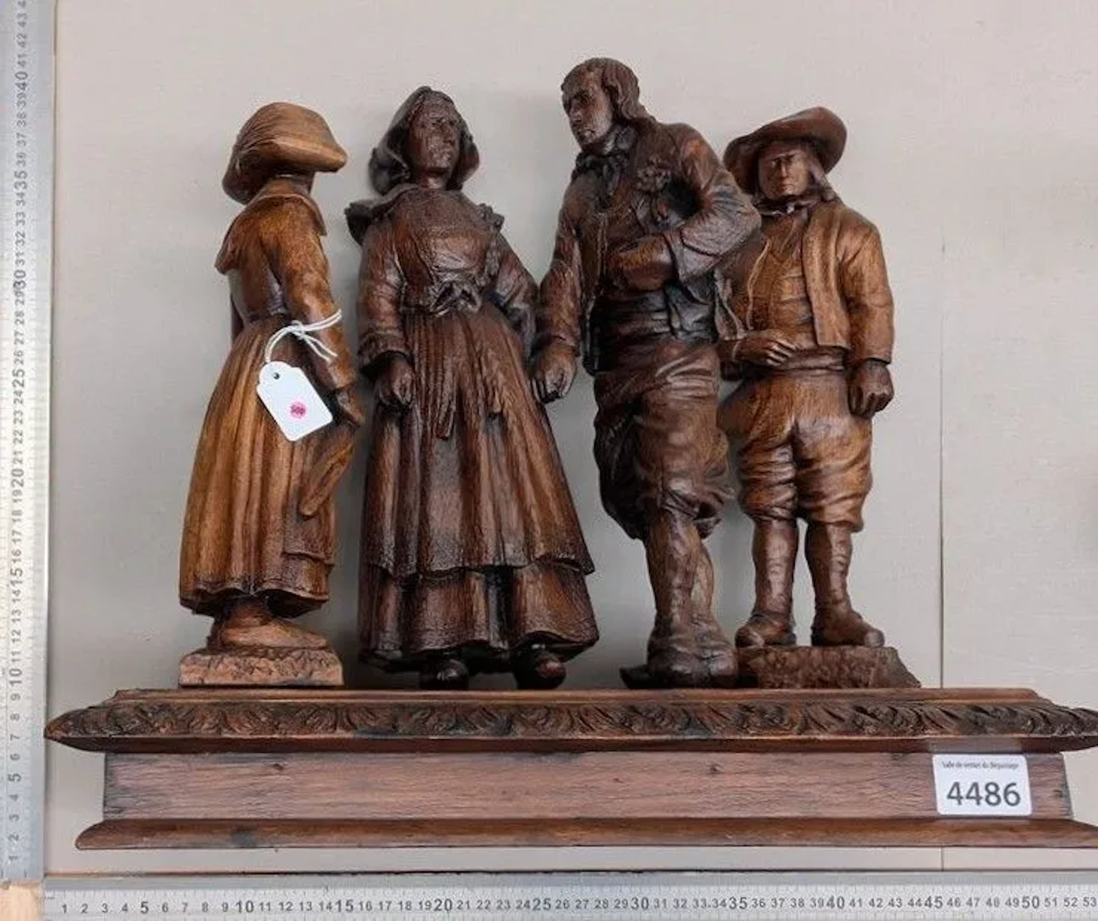 Set of 4 wooden sculptures depicting figures in 18th-century period