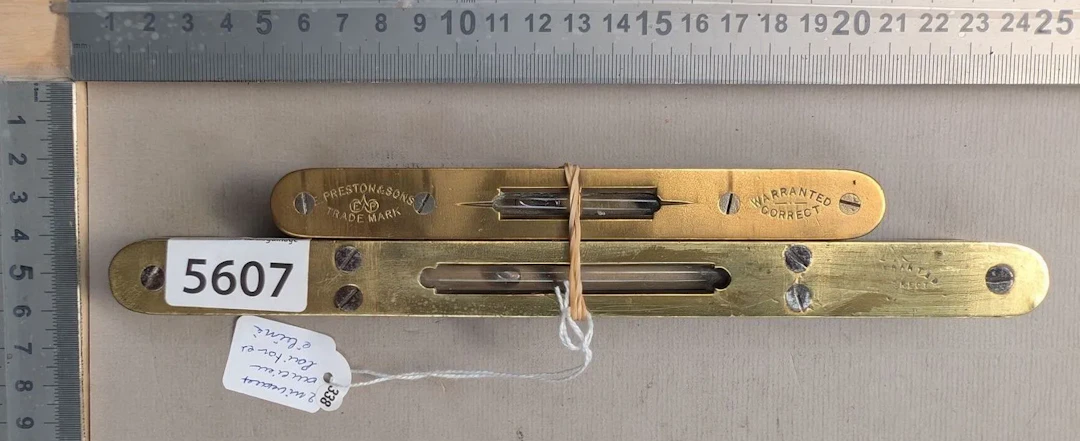 2 antique brass and ebony tiers—see photos for dimensions and condition