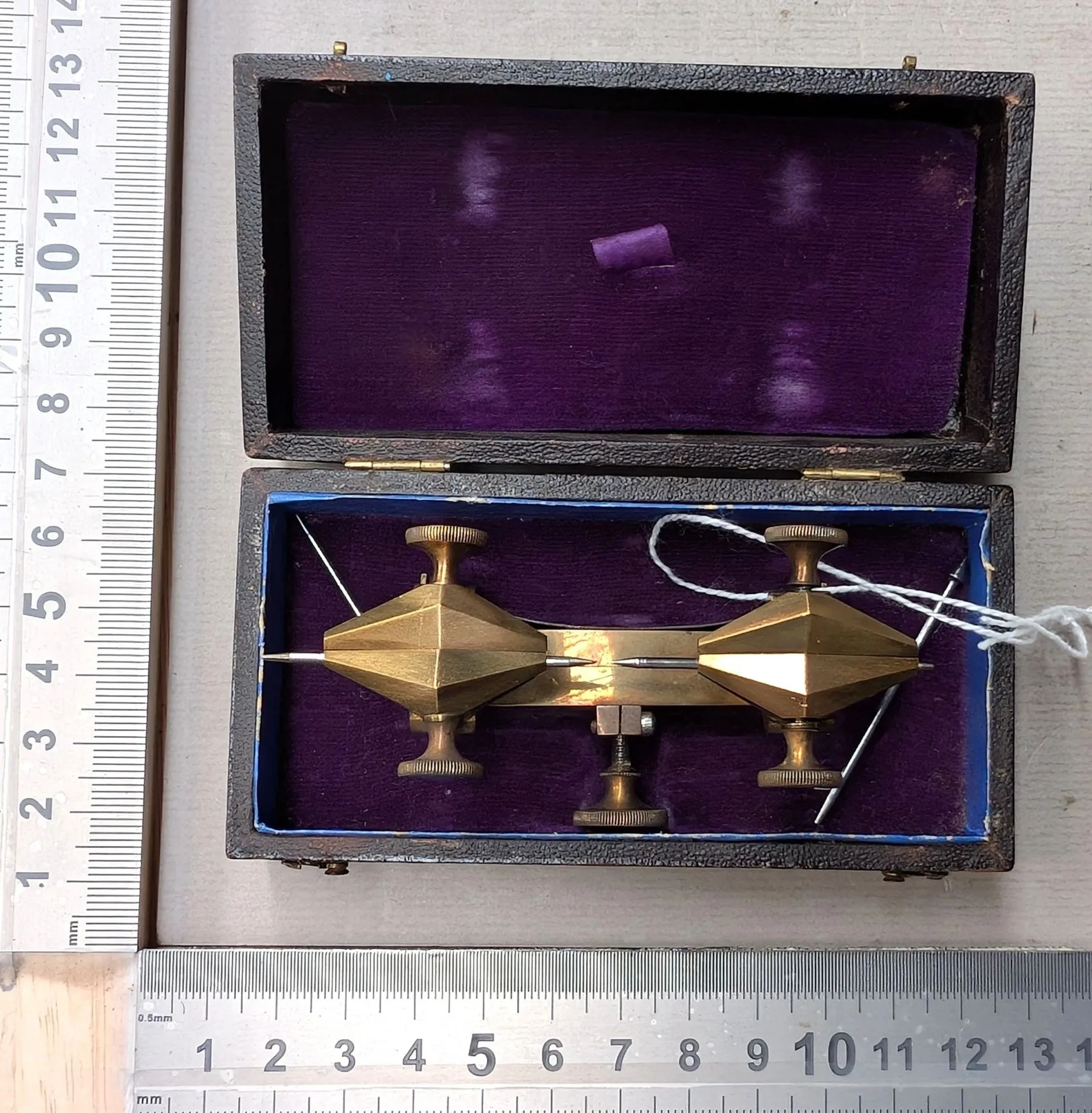 1 bronze watchmaker's compass in its case—see photos for dimensions