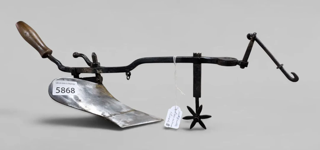 A model of an antique plow—see photos for dimensions and condition