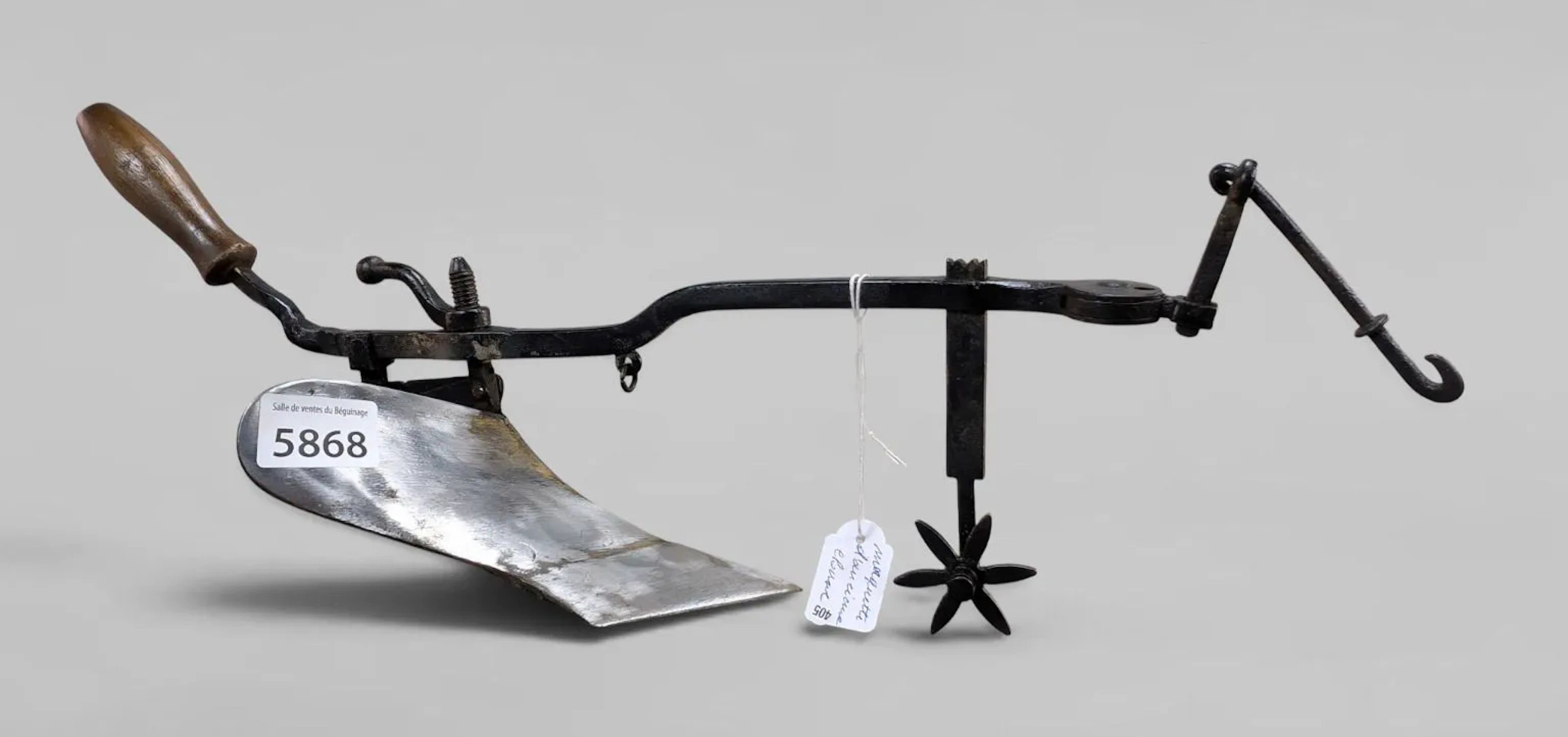 A model of an antique plow—see photos for dimensions and condition