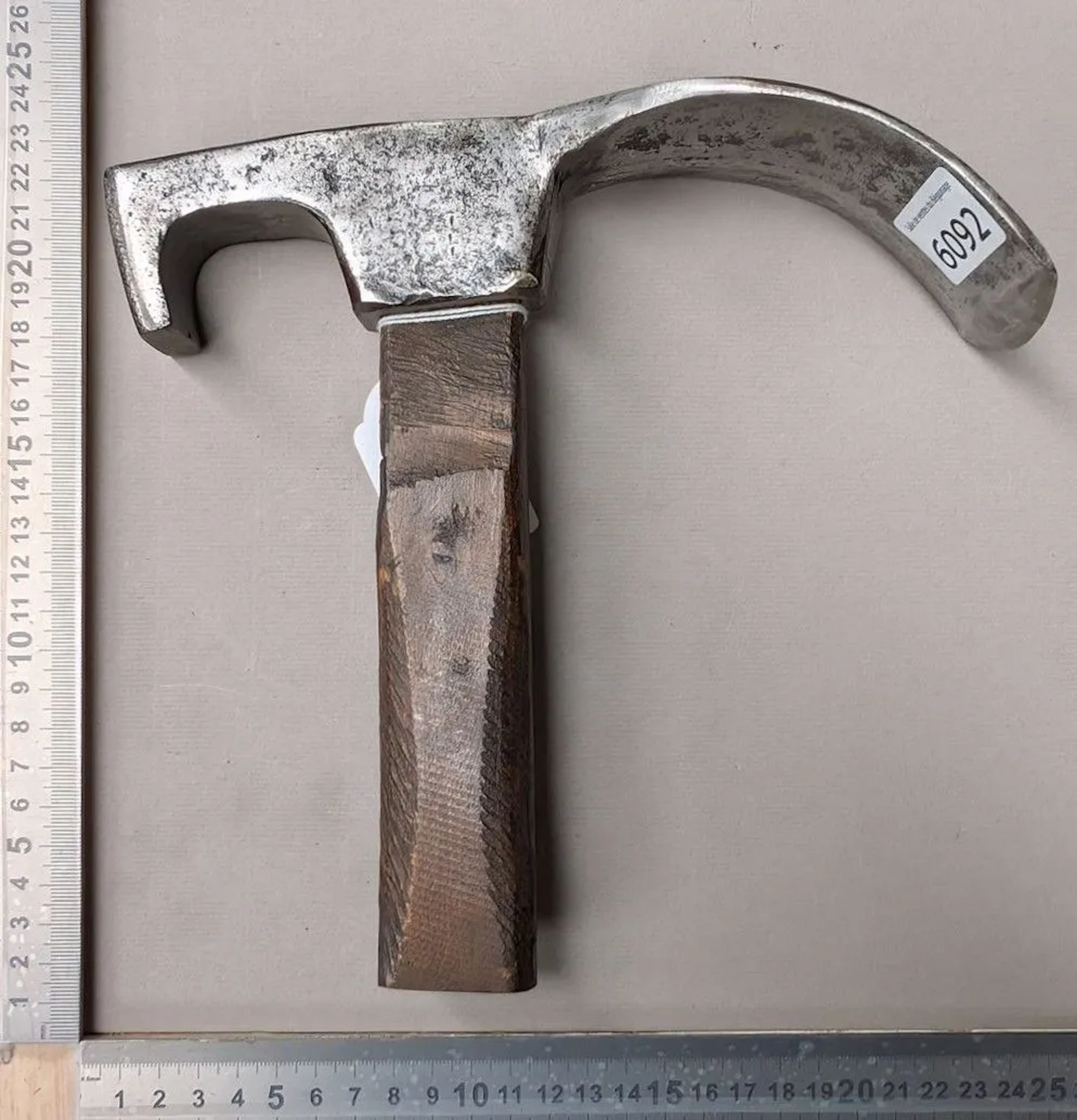 A forged steel adze—see photos for dimensions and condition