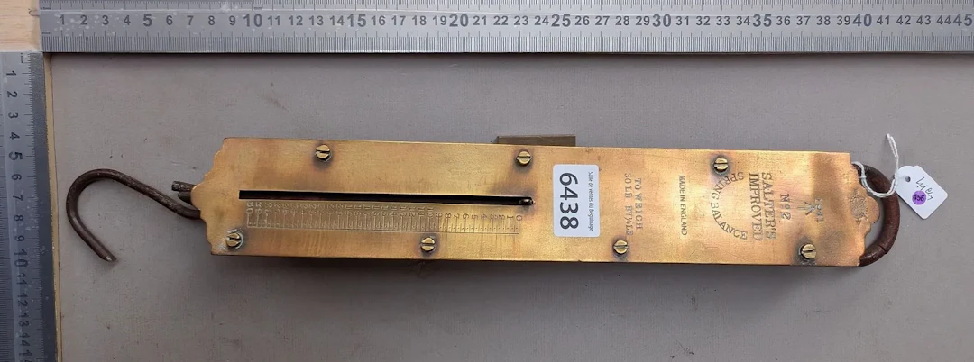 Vintage scale with a sliding needle that moves up and down—see photos