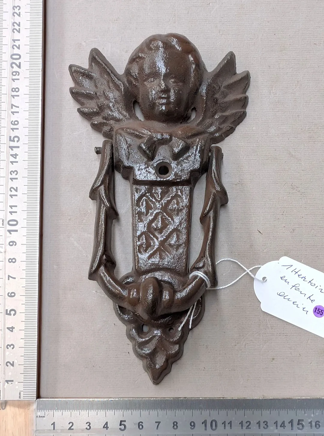 1 antique cast-iron door knocker—see photos for dimensions and condition
