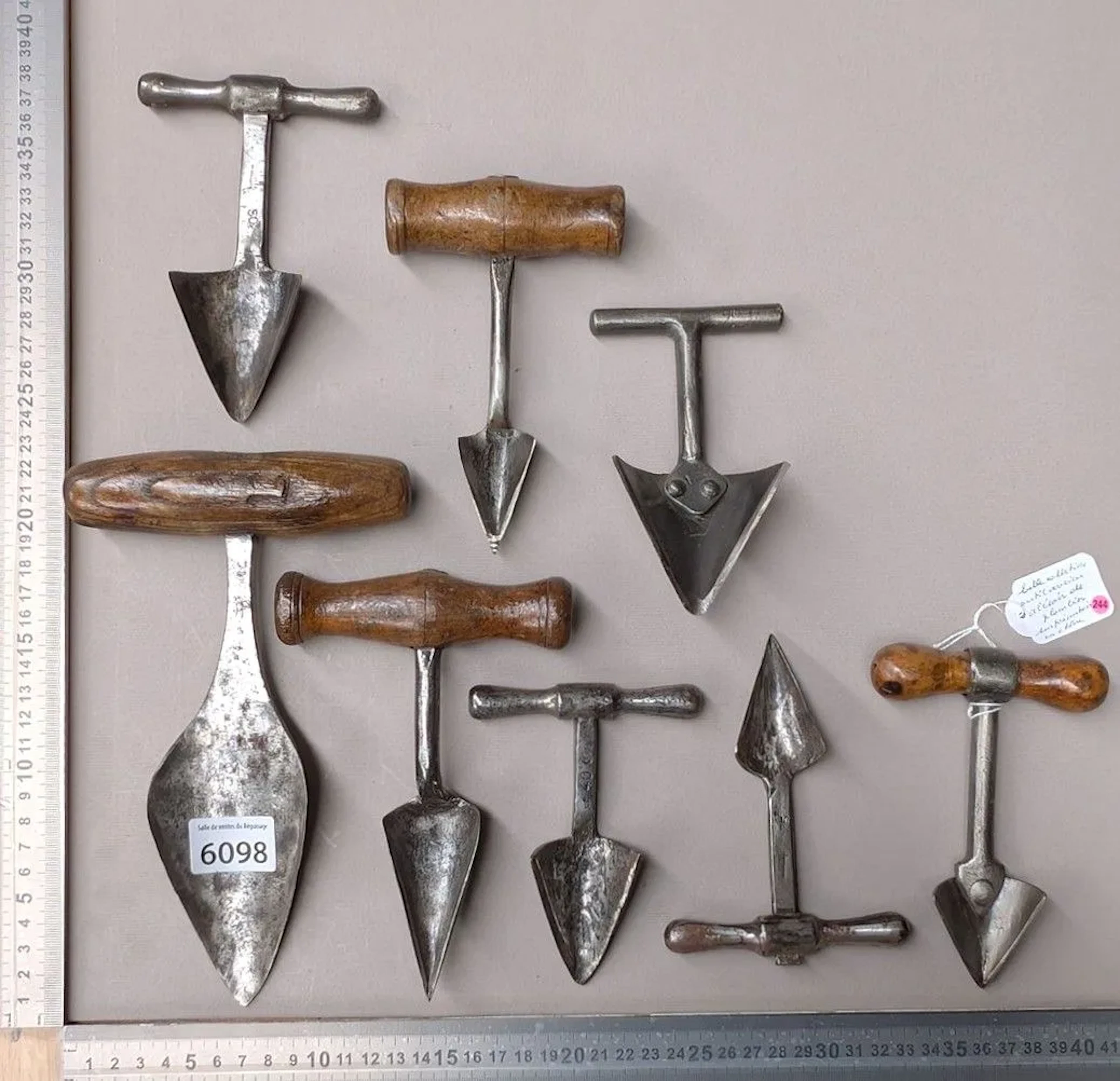 8 plumber's reamers on a display stand—see photos for dimensions and condition
