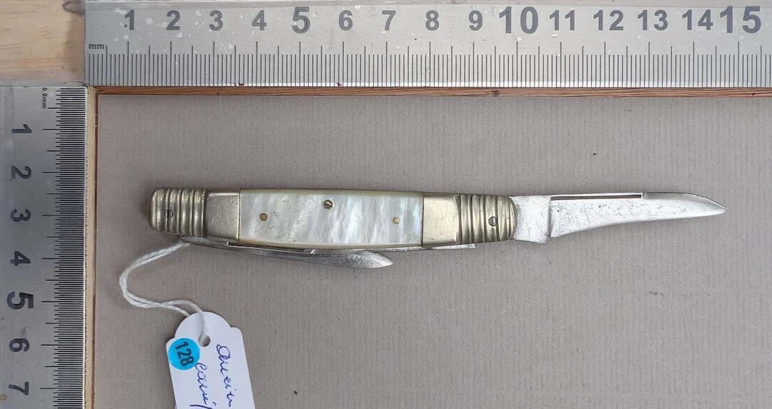 Antique 4-blade pocket knife—see photos for dimensions and condition