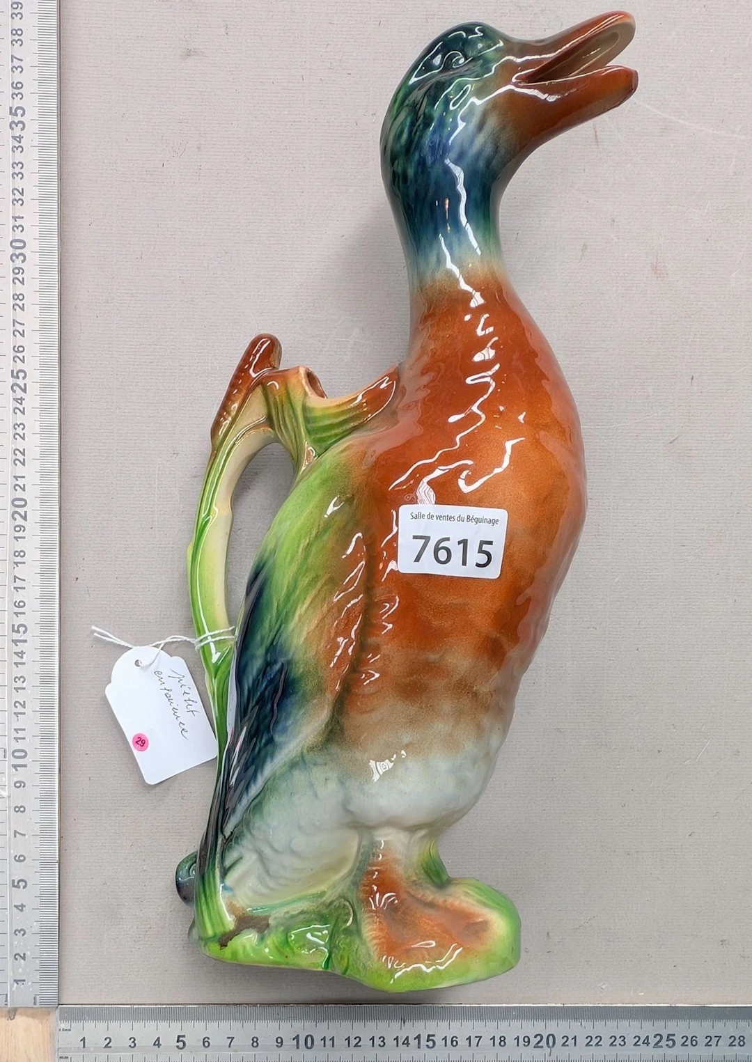 1 earthenware duck—see photos for dimensions and condition