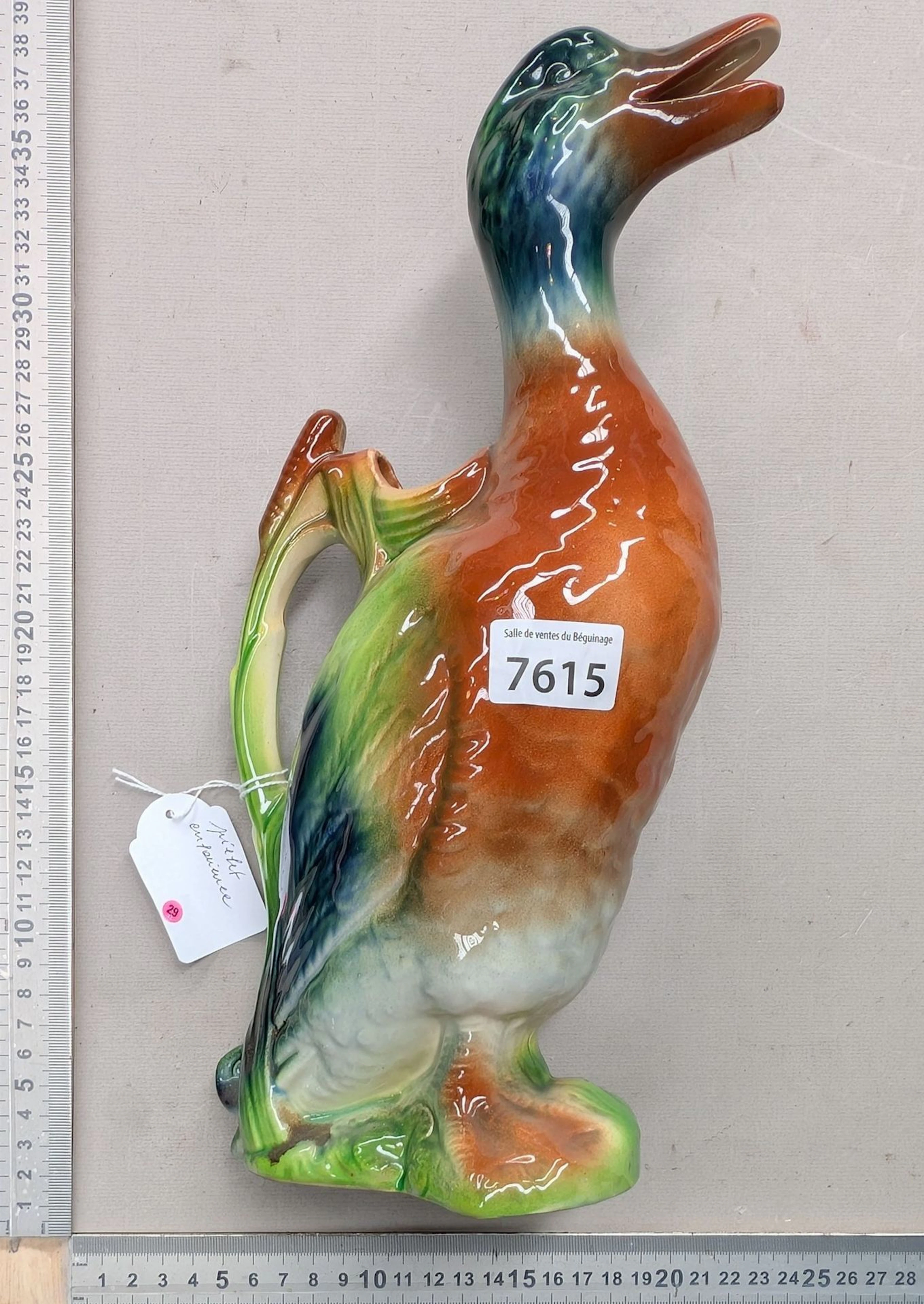 1 earthenware duck—see photos for dimensions and condition