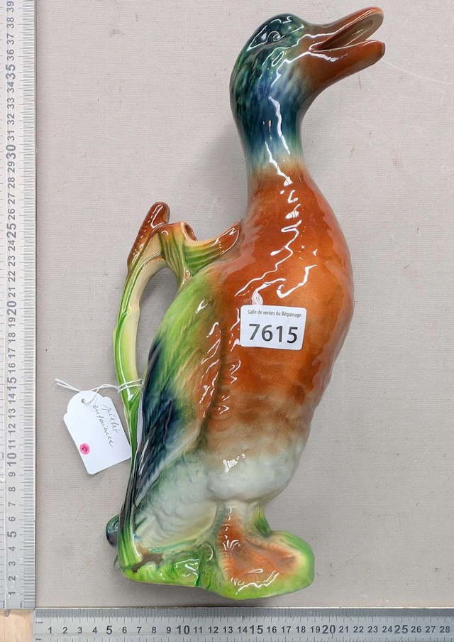 1 earthenware duck—see photos for dimensions and condition