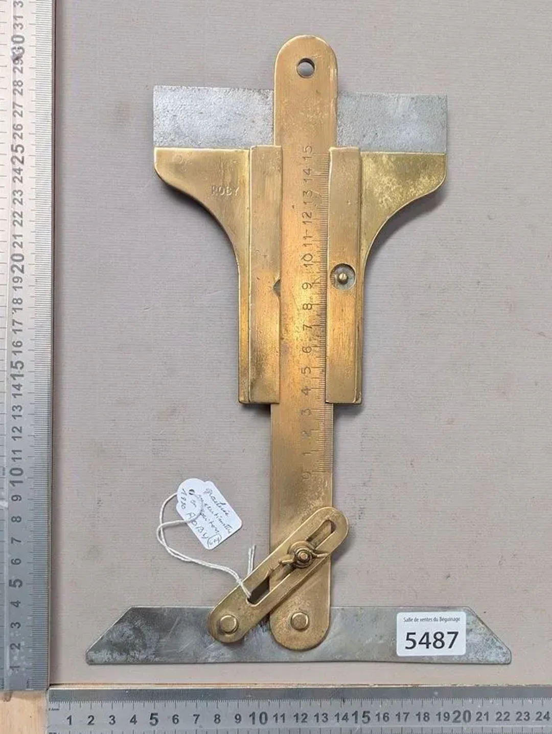 Antique adjustable set square with a central ruler graduated in hundredths