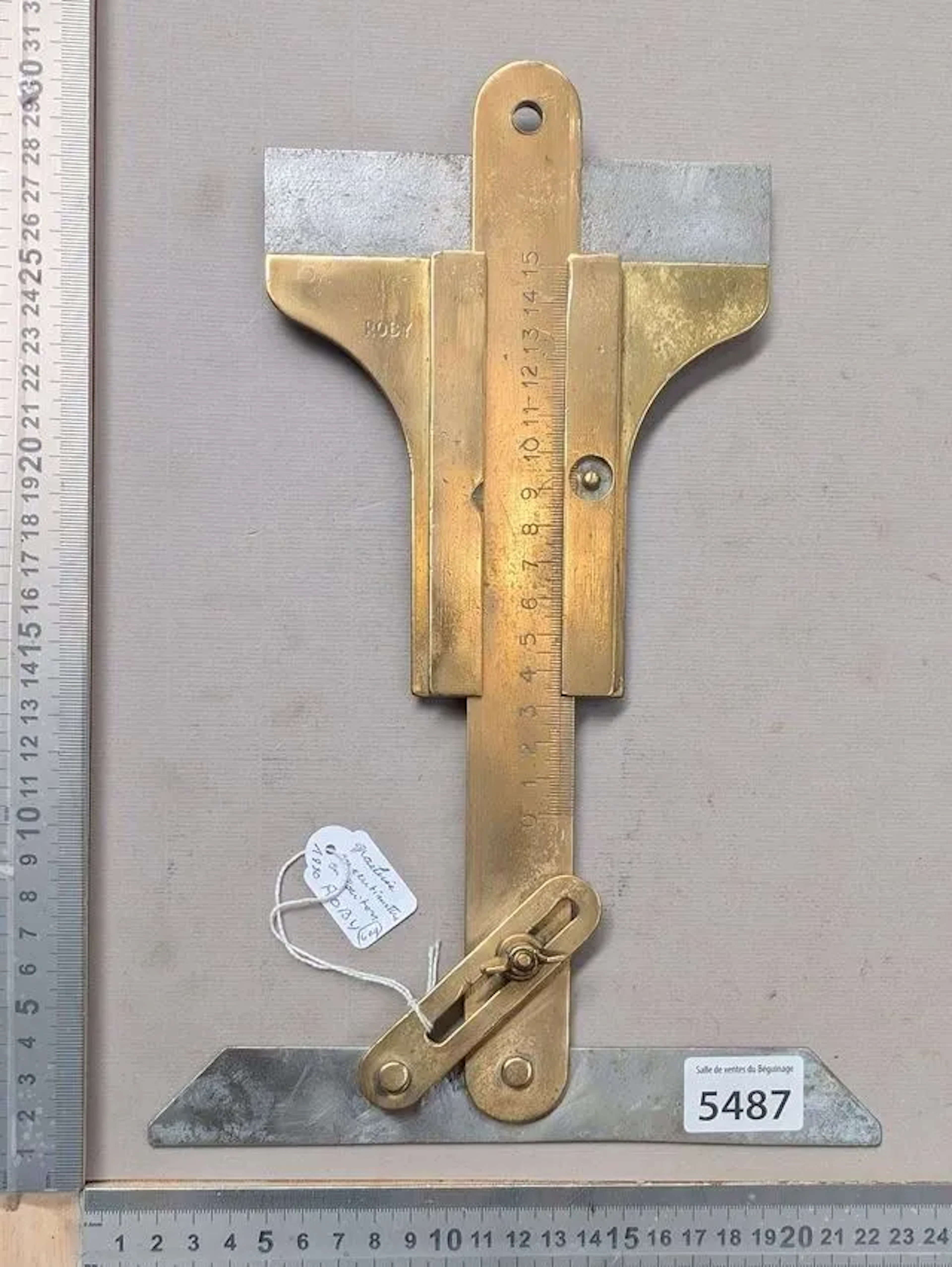 Antique adjustable set square with a central ruler graduated in hundredths