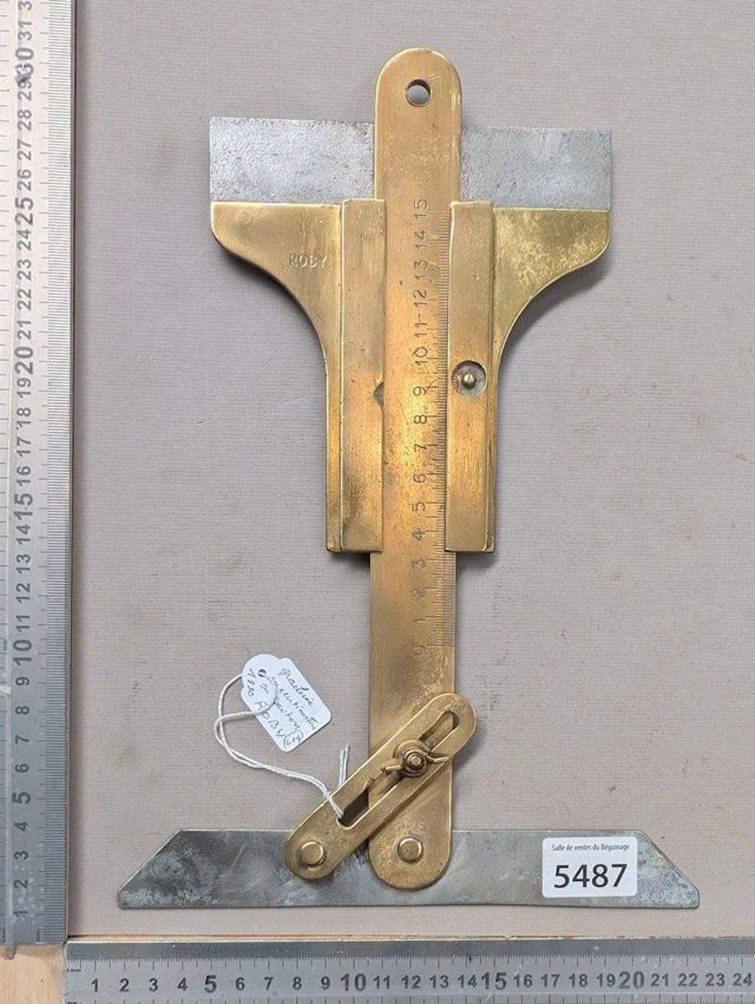 Antique adjustable set square with a central ruler graduated in hundredths