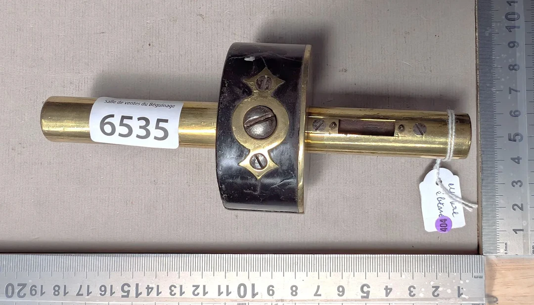 1 antique marine trusquin made of copper and ebony—see photos for