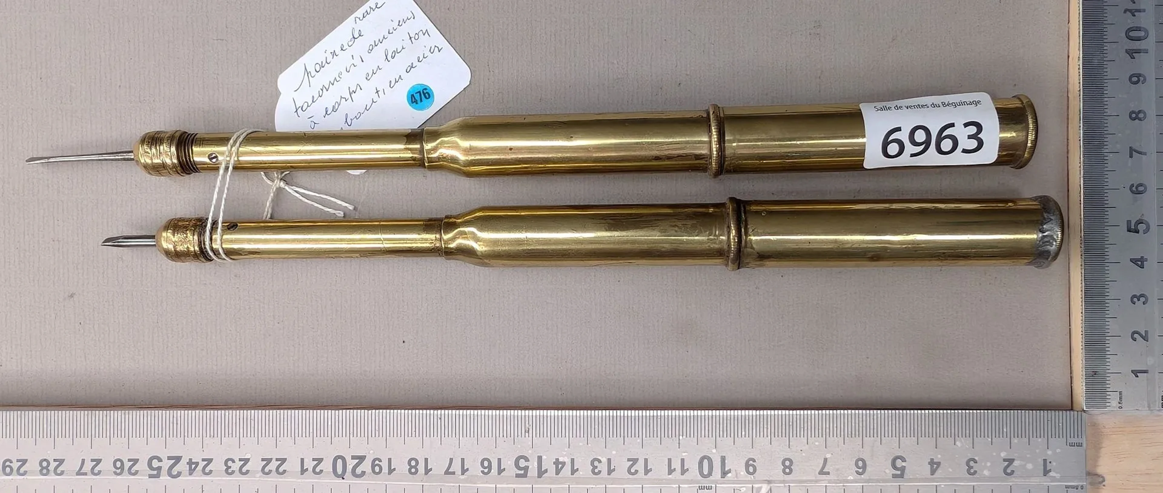 Rare pair of antique screwdrivers with brass shafts and steel tips—see