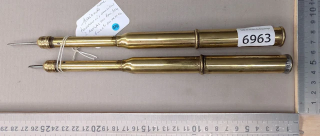 Rare pair of antique screwdrivers with brass shafts and steel tips—see