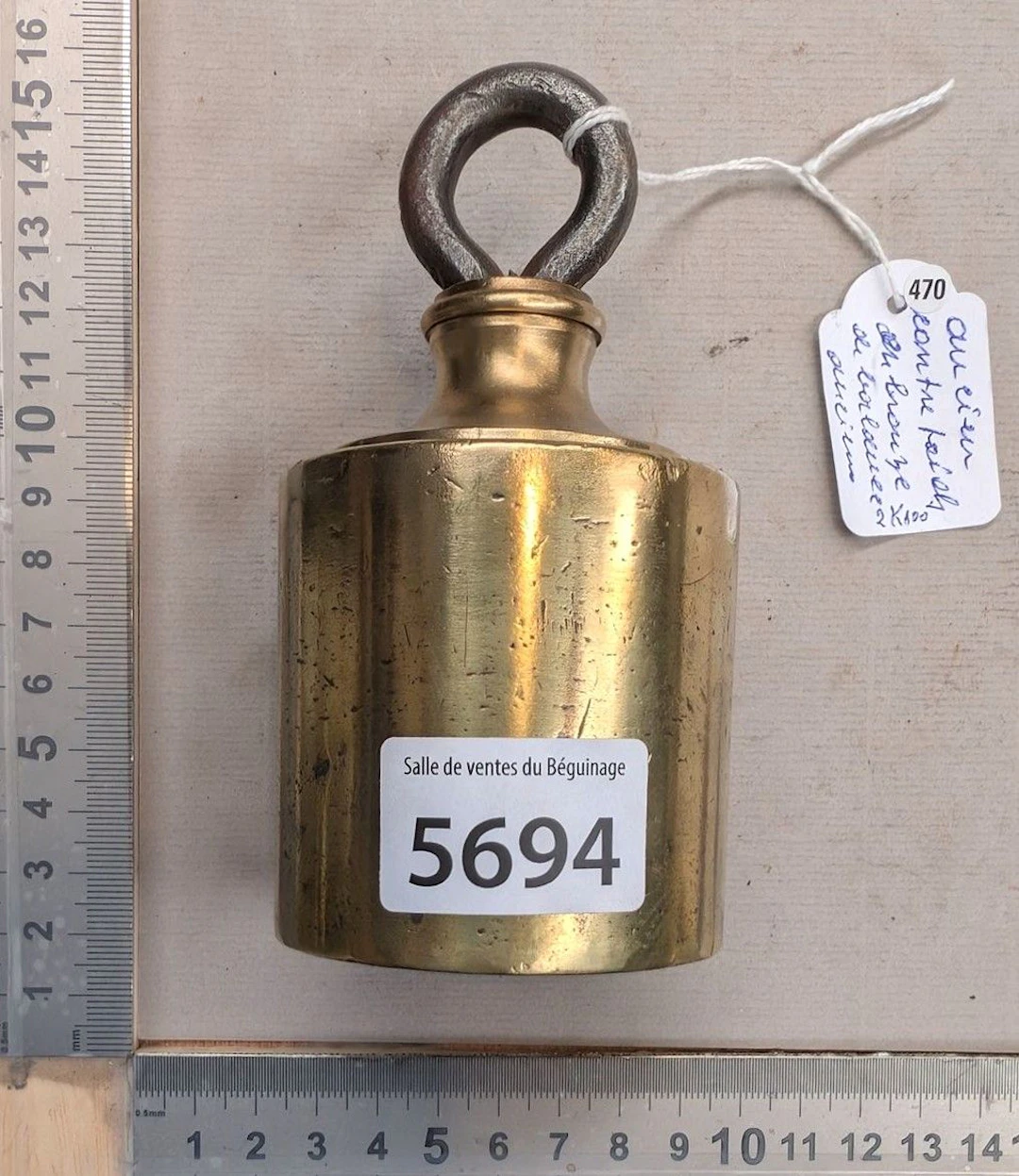 A 2 kg 100-year-old brass balance counterweight—see photos for dimensions