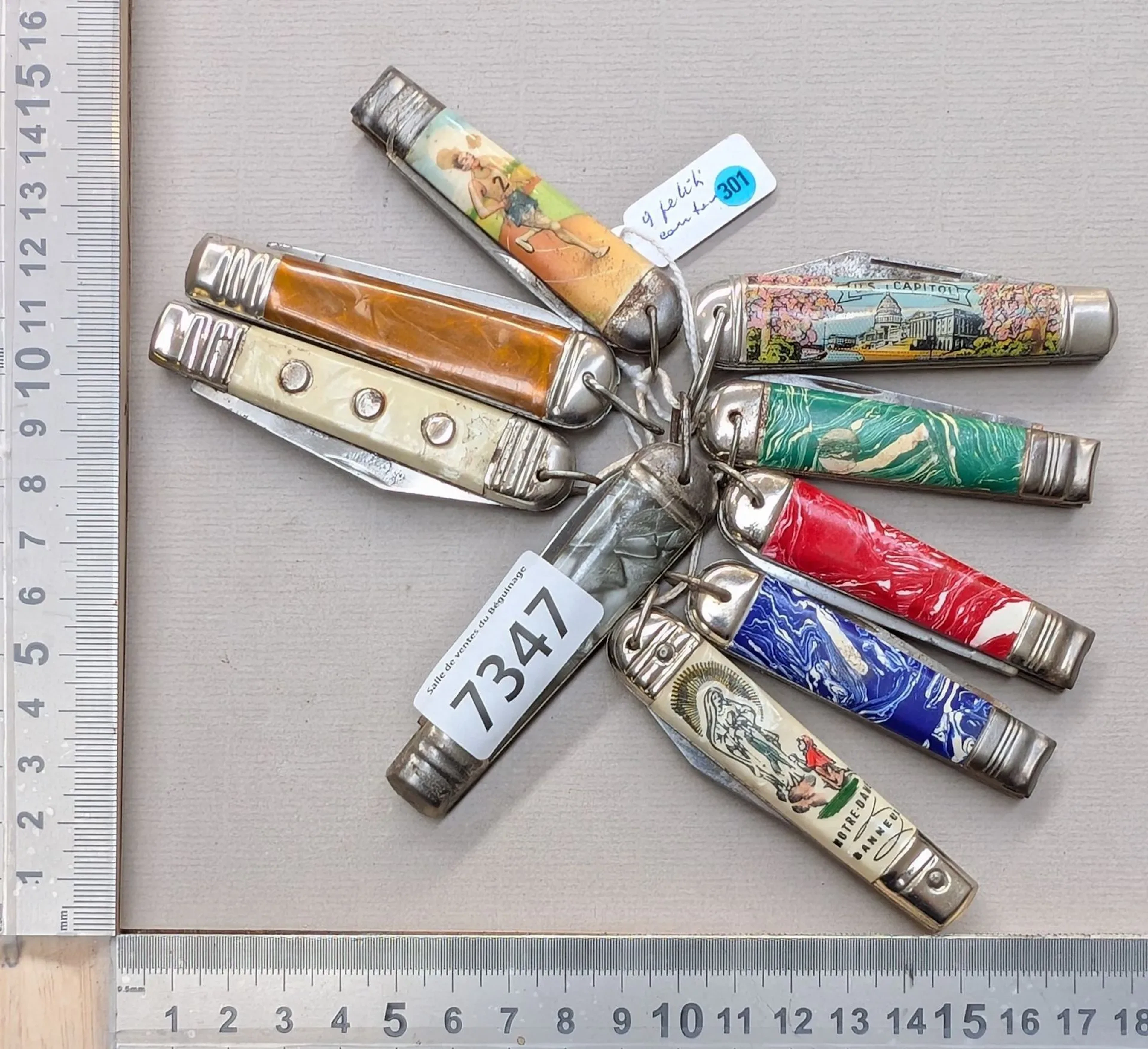 9 small children's knives—see photos for dimensions and condition