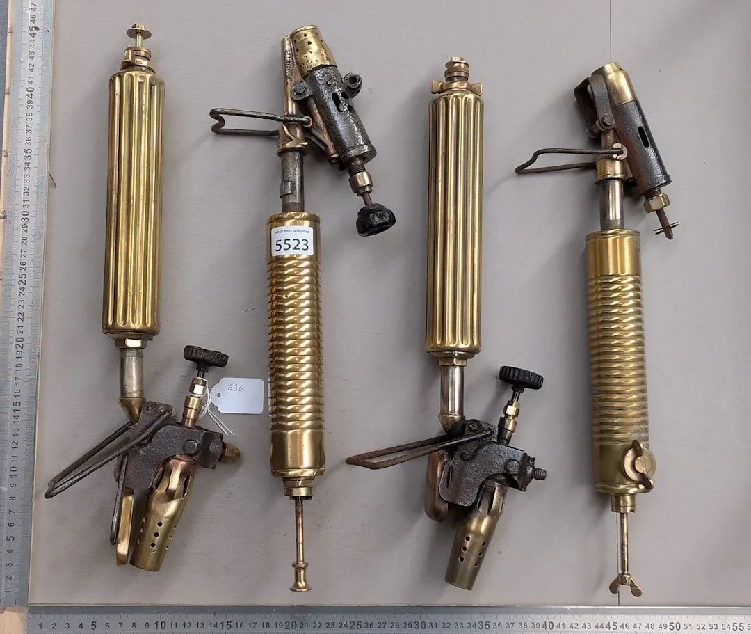 4 antique welding torches—see hallmark—Dimensions and condition: see photos
