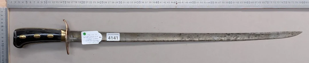 1 large saber with an ebony hilt, 3 rivets, and brass trim—see photos