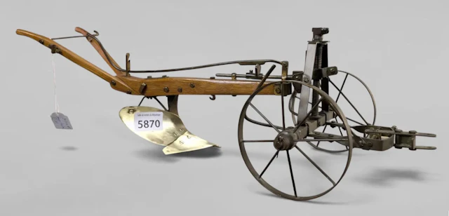 A model of an antique plow—45 cm—condition: see photos