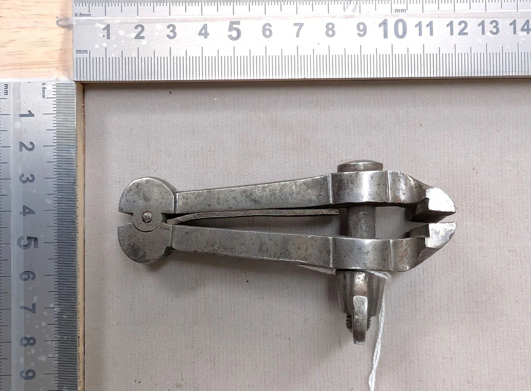 1 pair of wrought-iron watchmaker's hand vises—see photos for dimensions