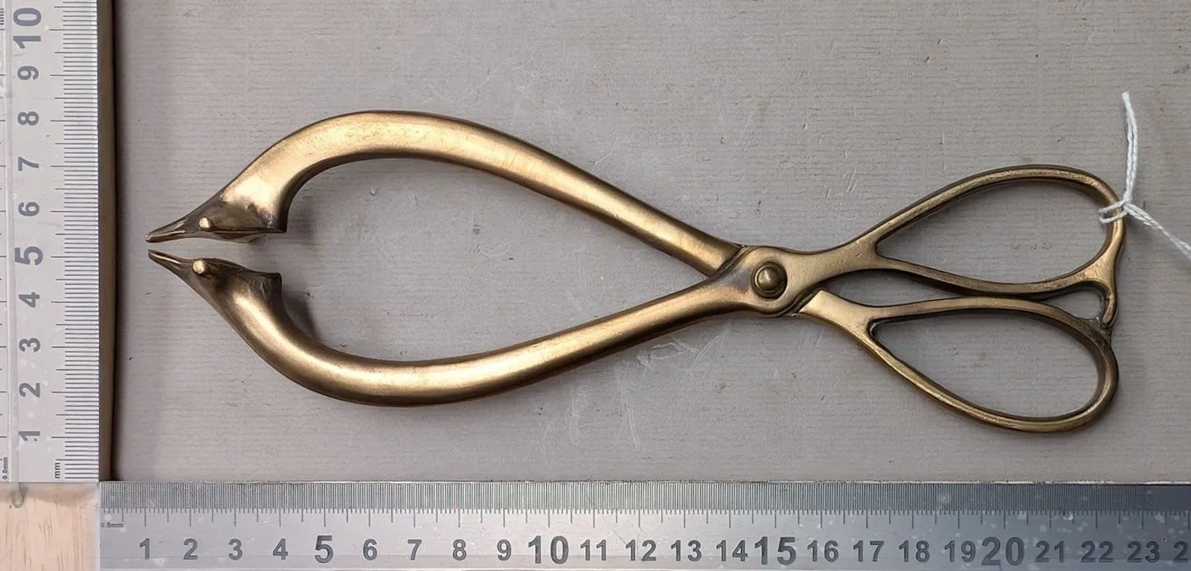 1 brass fire tongs - See photos for dimensions and condition