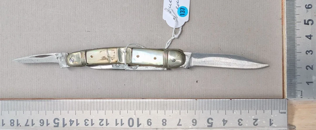 Antique pocket knife with two blades and a pair of scissors—see photos