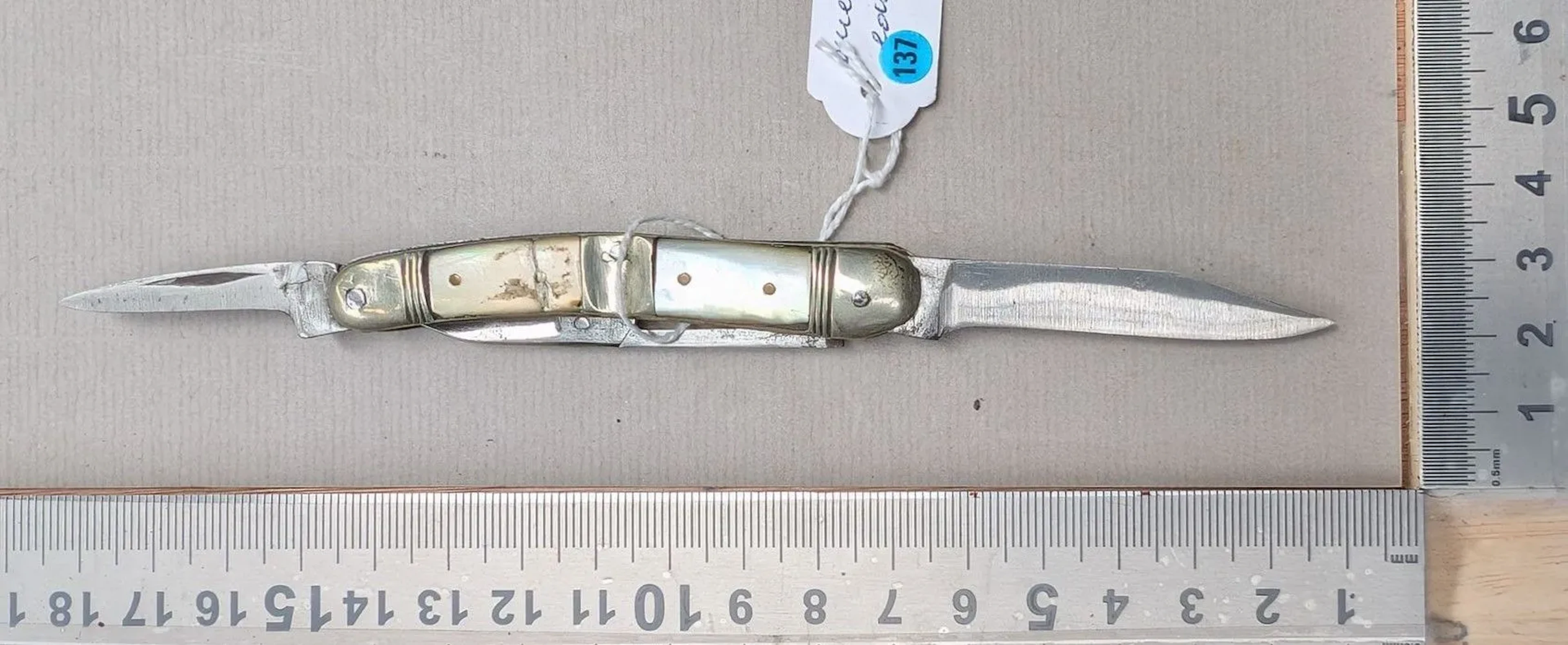 Antique pocket knife with two blades and a pair of scissors—see photos
