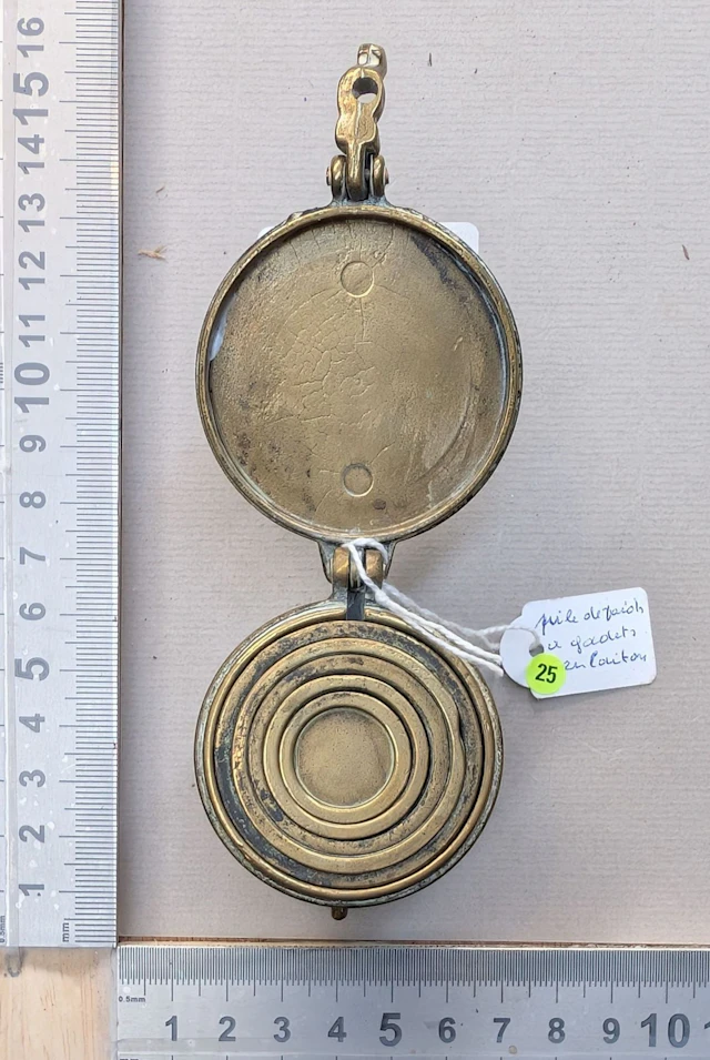 Stack of brass cup weights—see photos for dimensions and condition