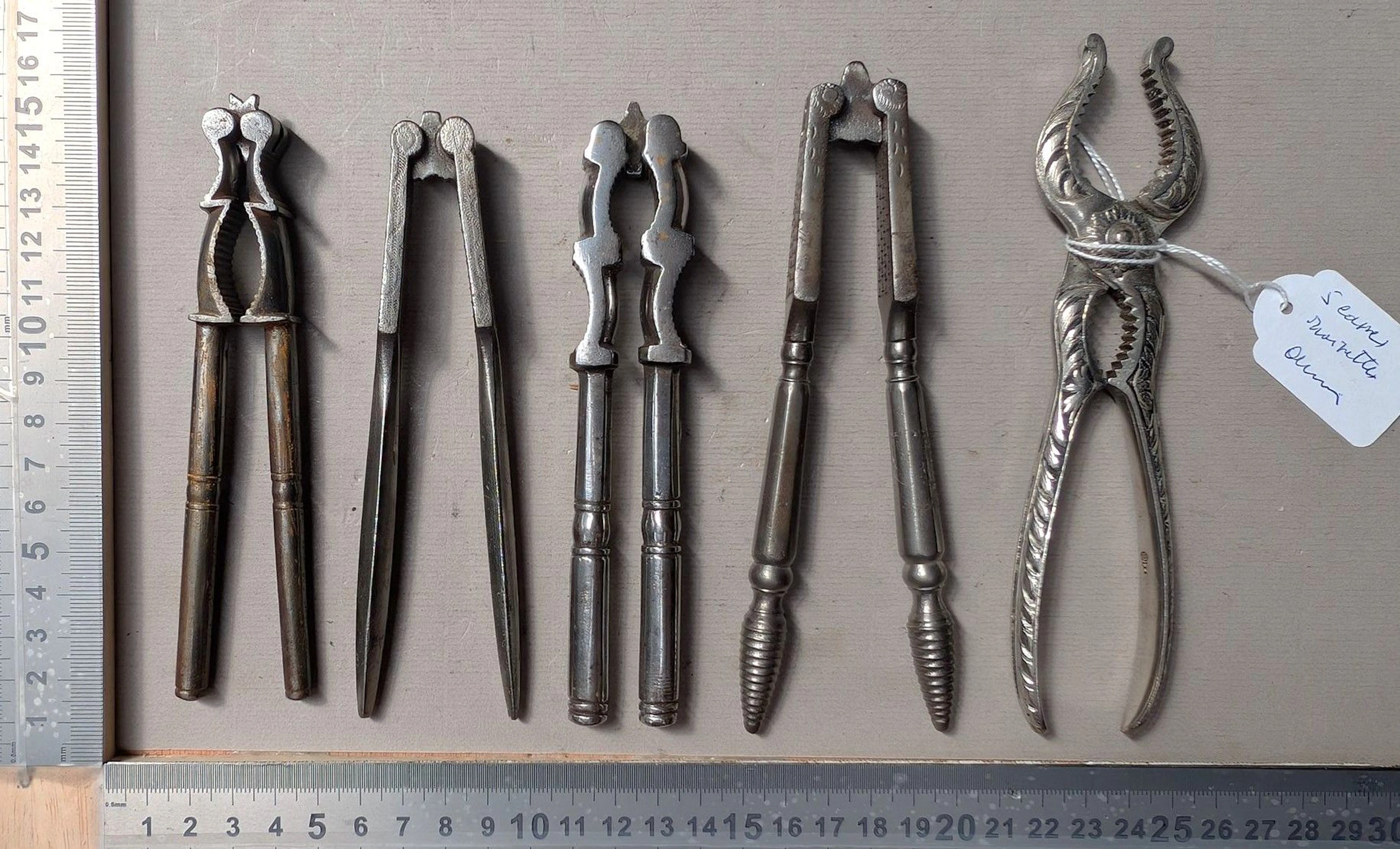 5 antique nutcrackers—see photos for dimensions and condition