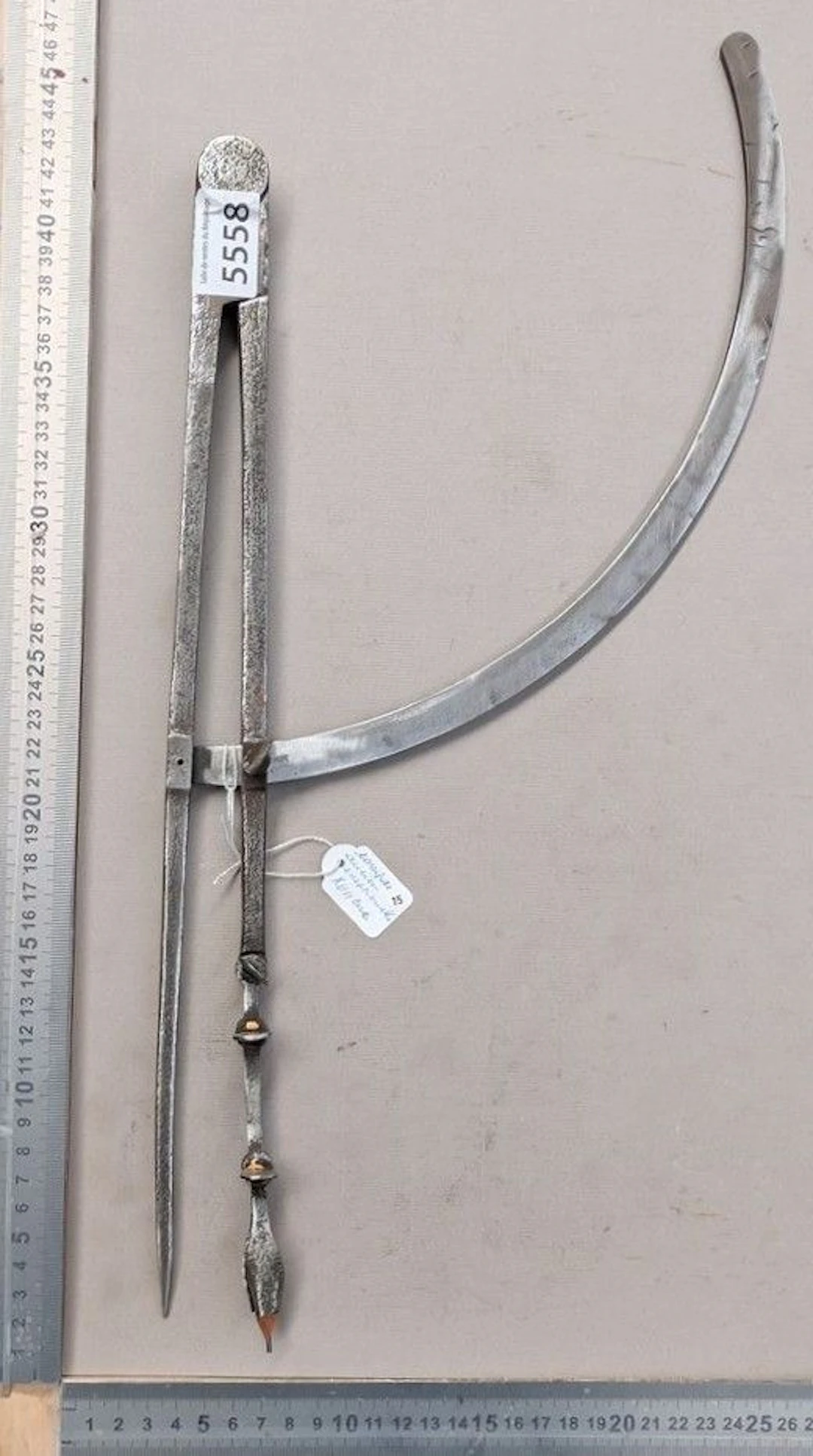 An antique 17th-century compass, in very good condition—see photos