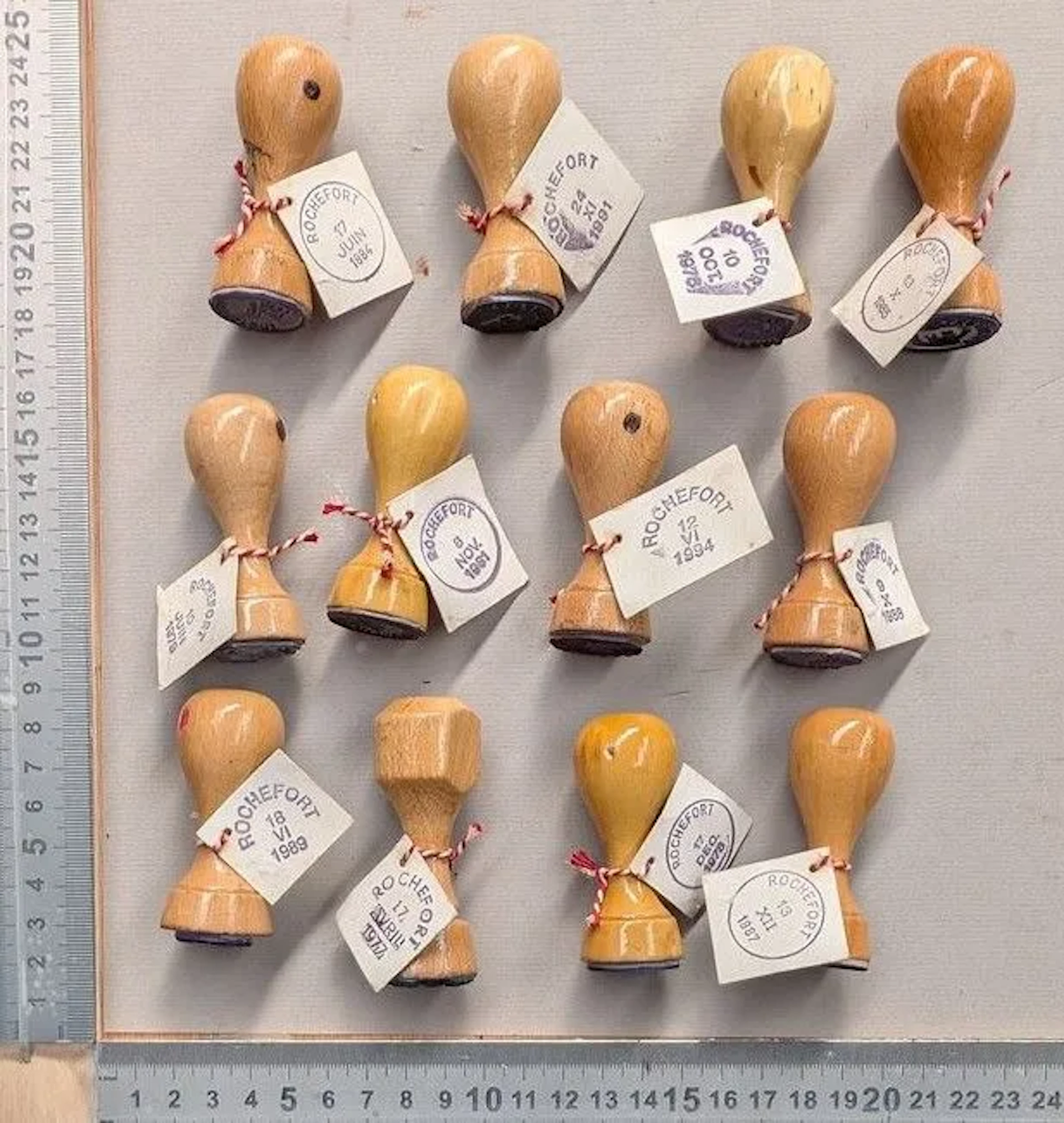 Display stand holding 12 ROCHEFORT stamps + date—see photos for dimensions