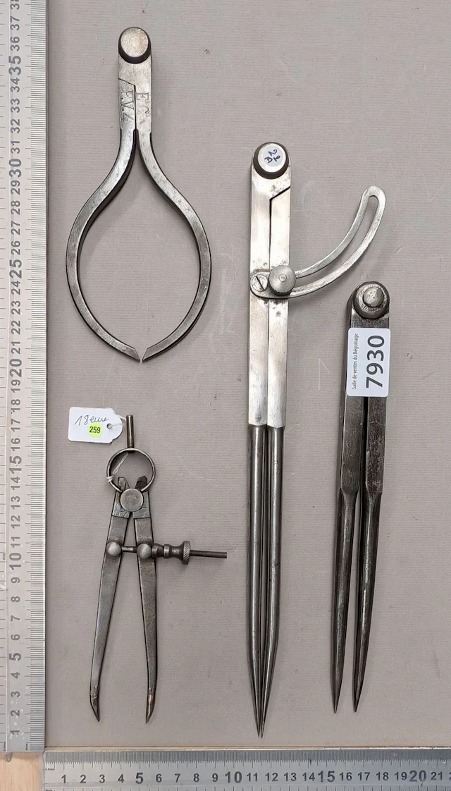 1 set of 4 different wrought-iron compasses—see photos for dimensions