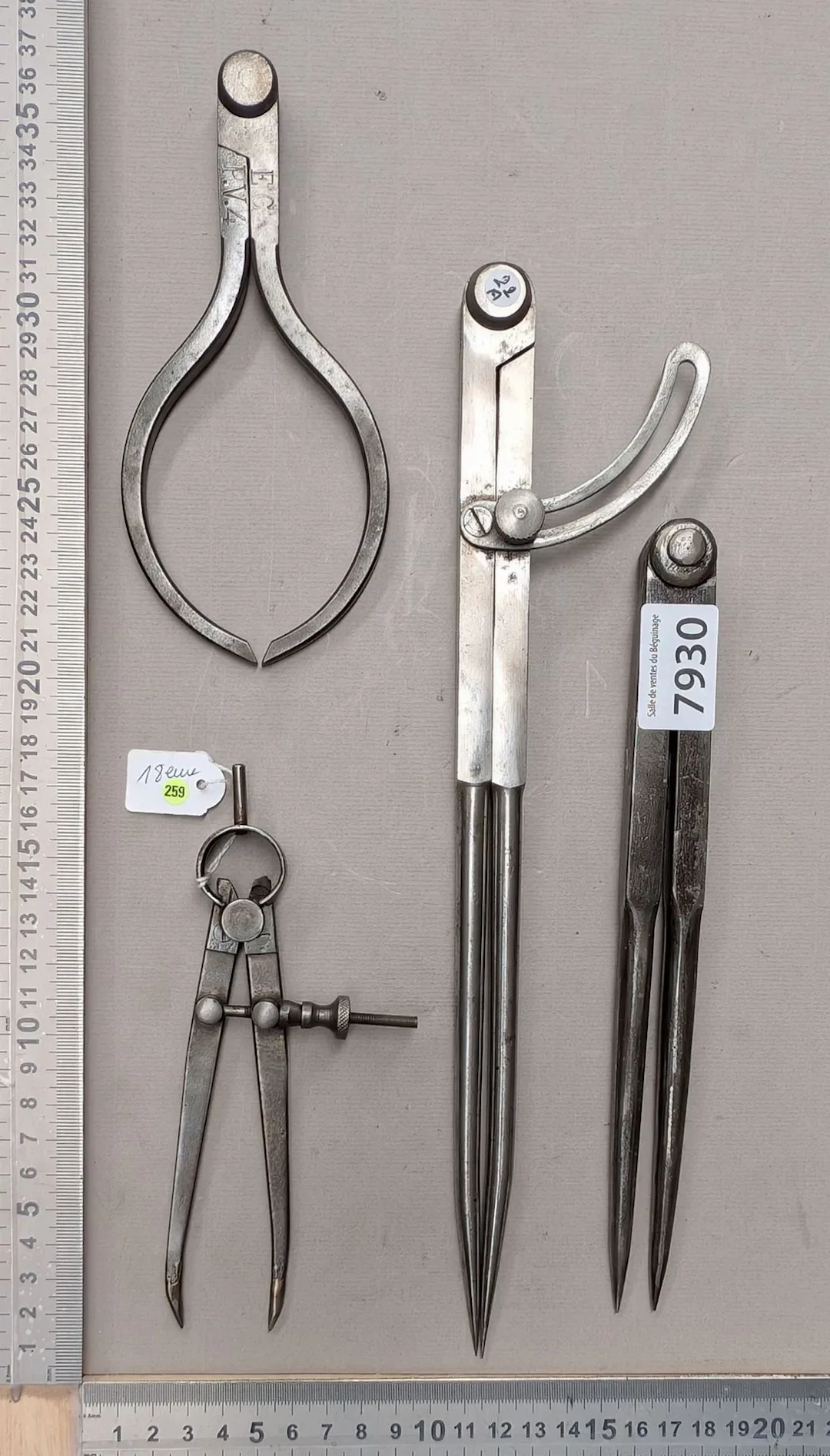 1 set of 4 different wrought-iron compasses—see photos for dimensions