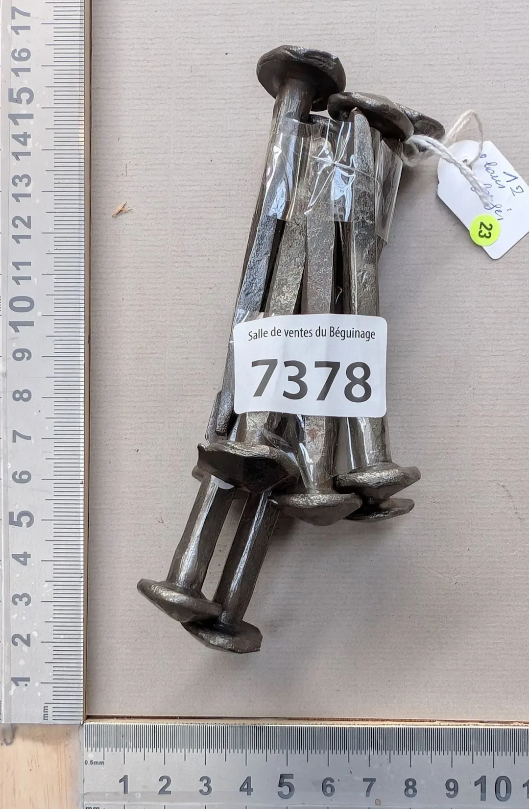 12 very old wrought-iron nails—see photos for dimensions and condition