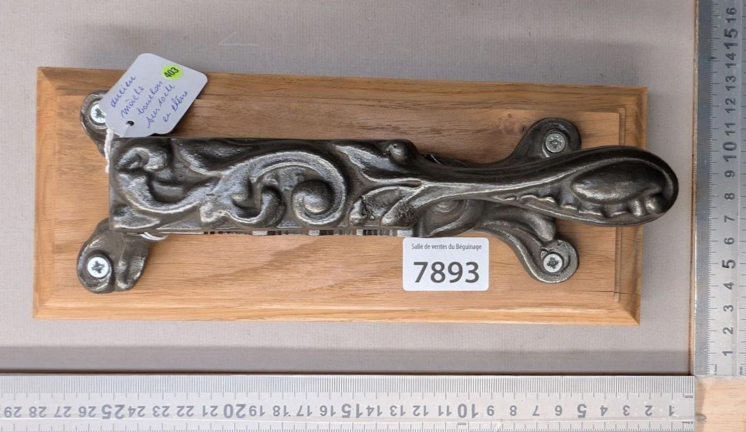 1 antique cast-iron cork-stopping tool on an oak base—see photos for