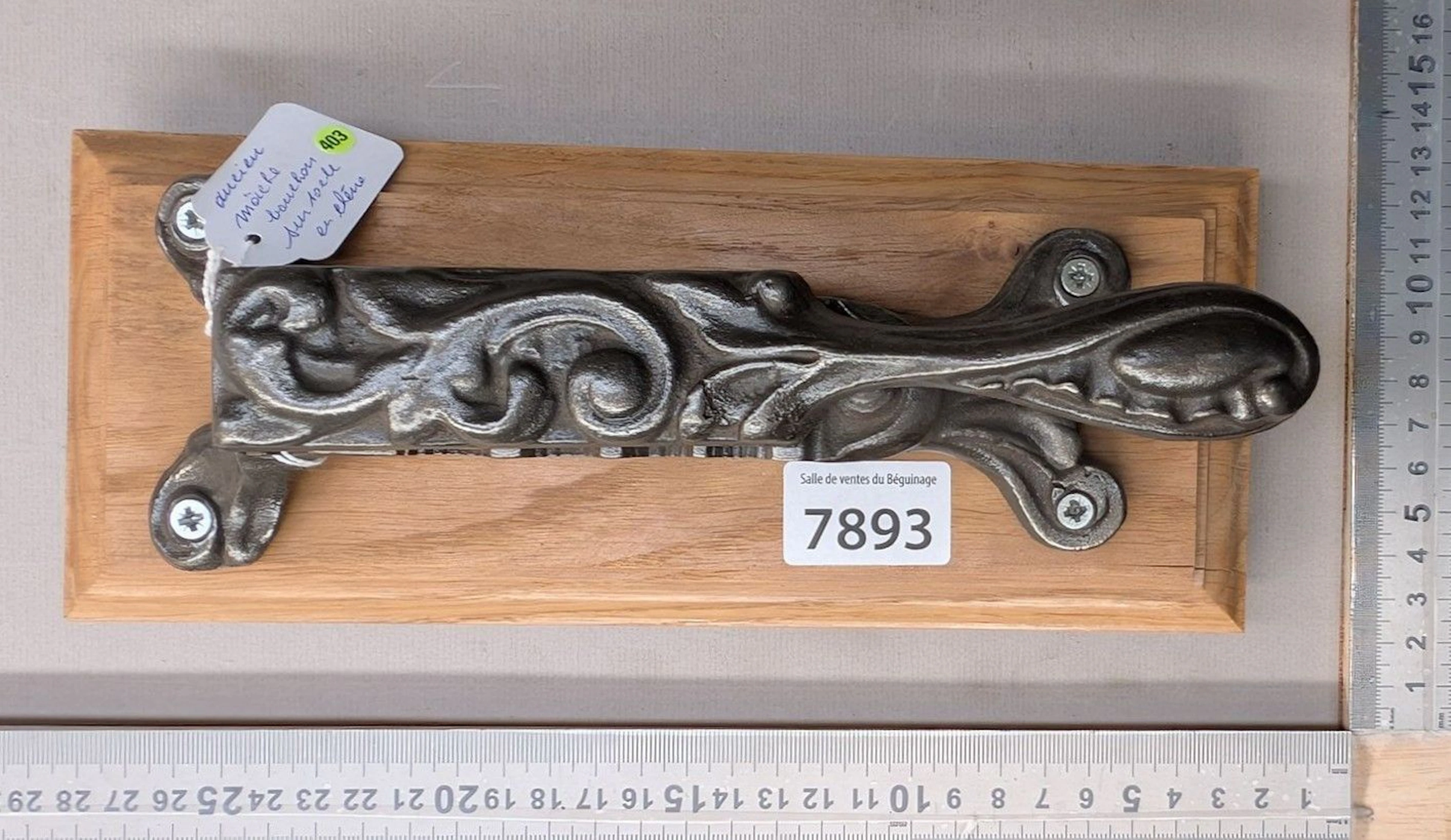 1 antique cast-iron cork-stopping tool on an oak base—see photos for