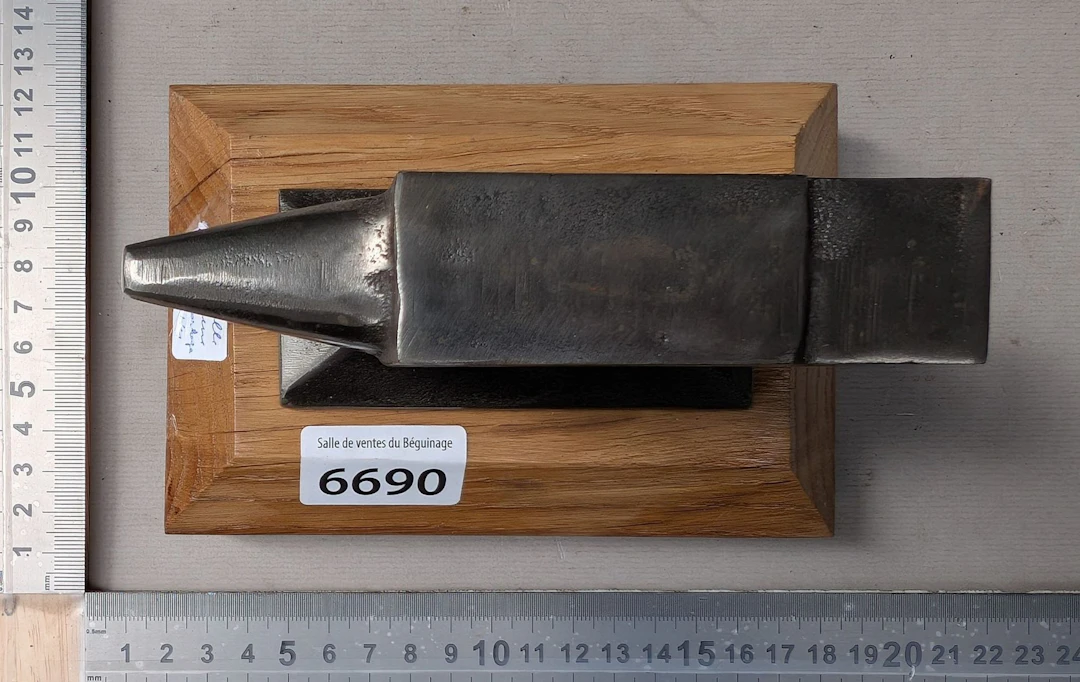 Beautiful watchmaker's anvil on an oak base—see photos for dimensions