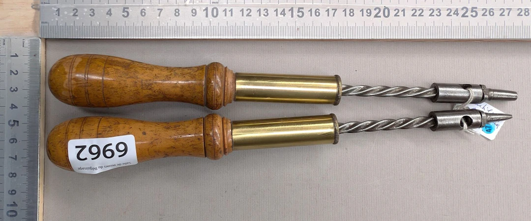 2 very old spiral-bladed shoemaker's punches from Germany—see photos