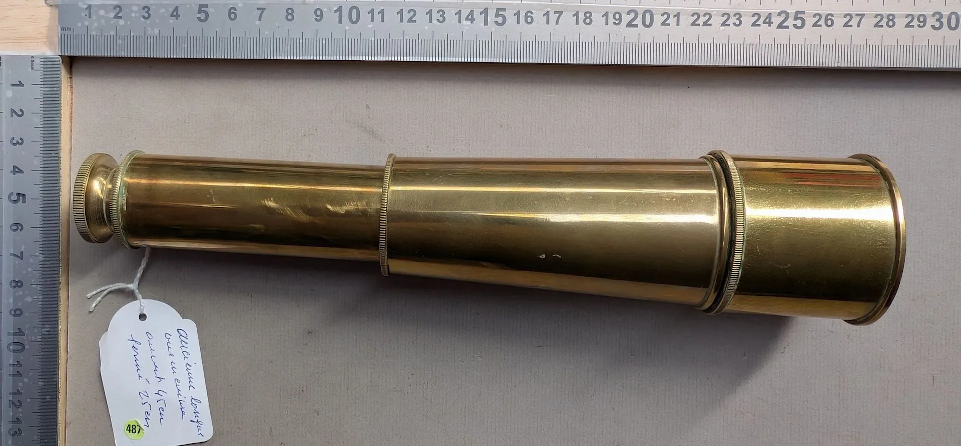 1 antique copper telescope, 45 cm when open and 25 cm when closed—see