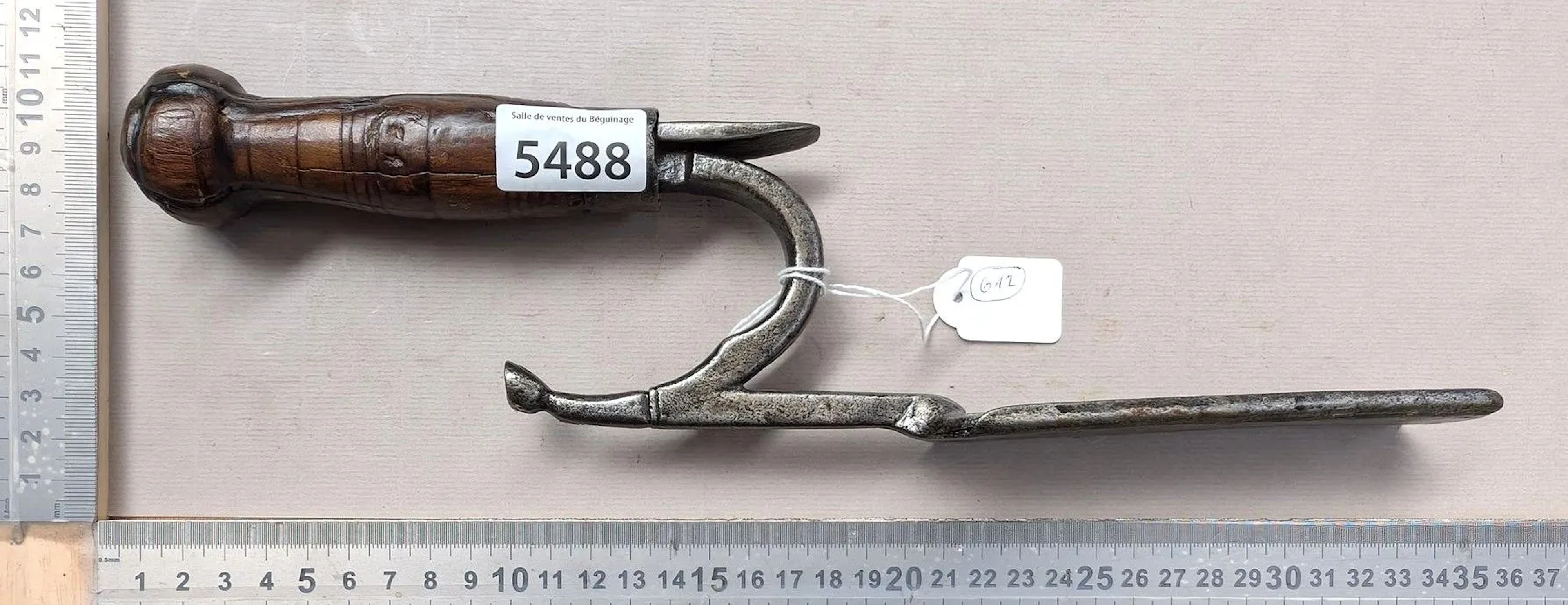 Antique farrier's anvil, beautifully decorated, with a horseshoe from