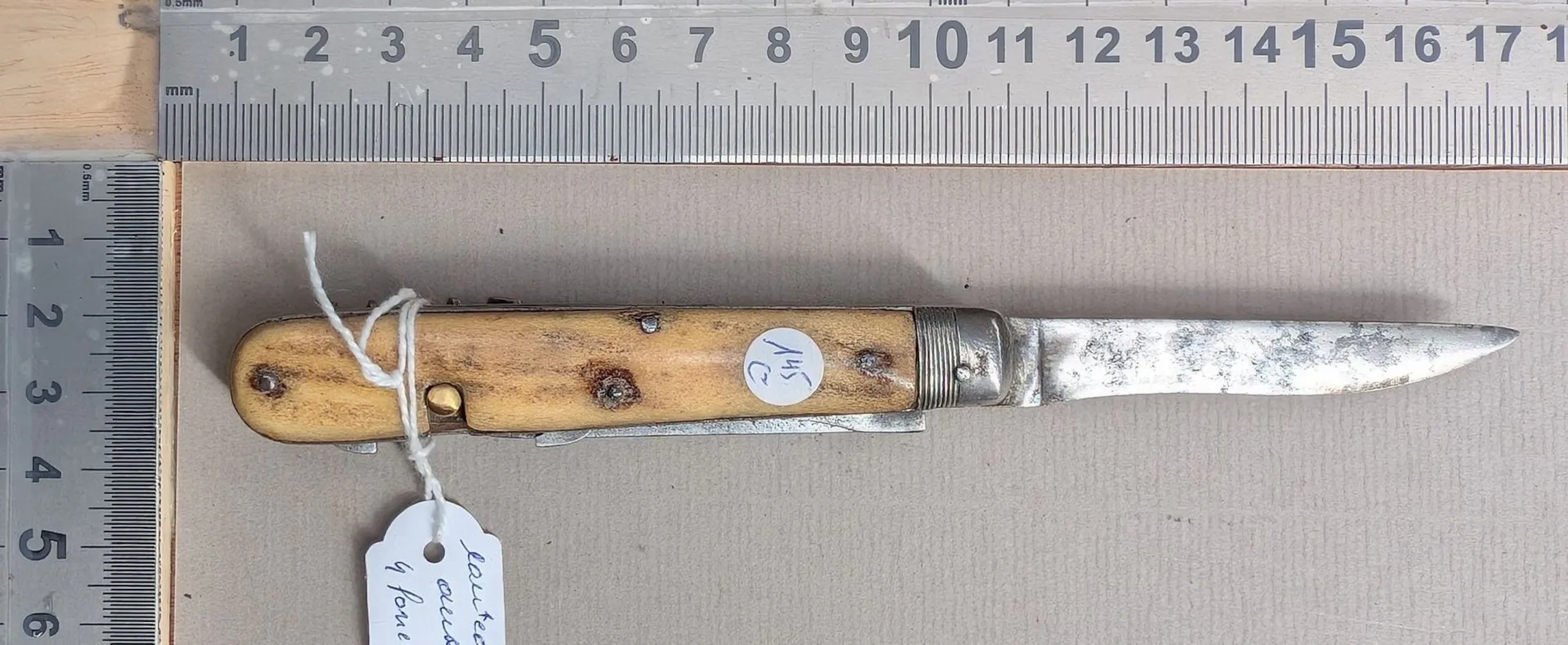 Vintage multi-purpose knife—see photos for dimensions and condition