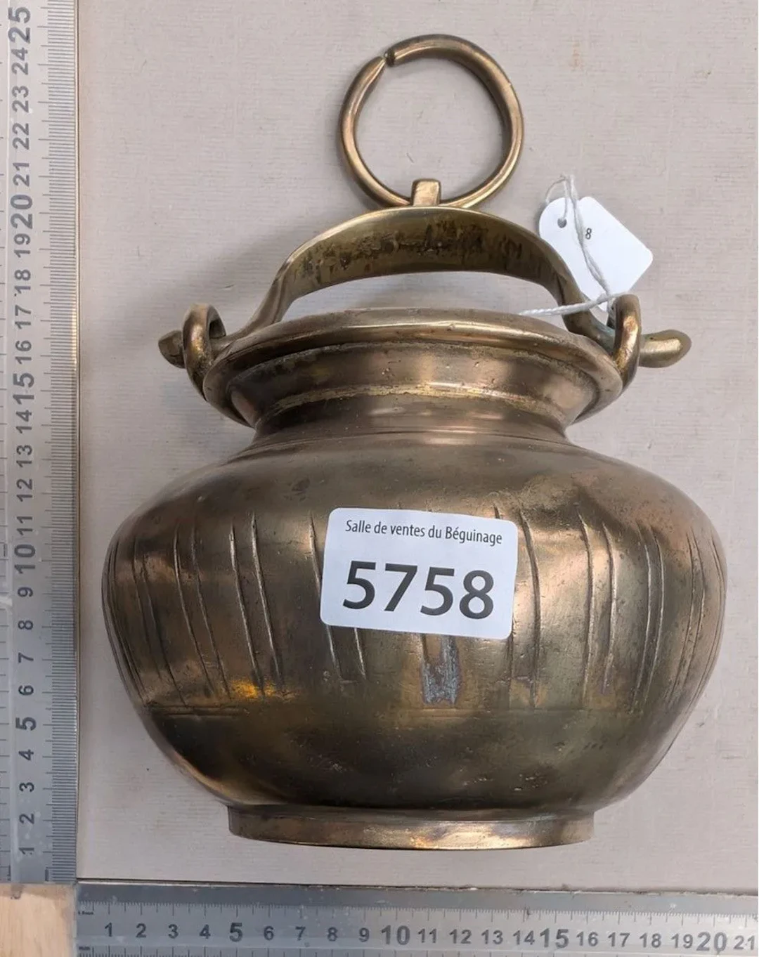Rare small 17th-century bronze pot with a loop handle, slight crack