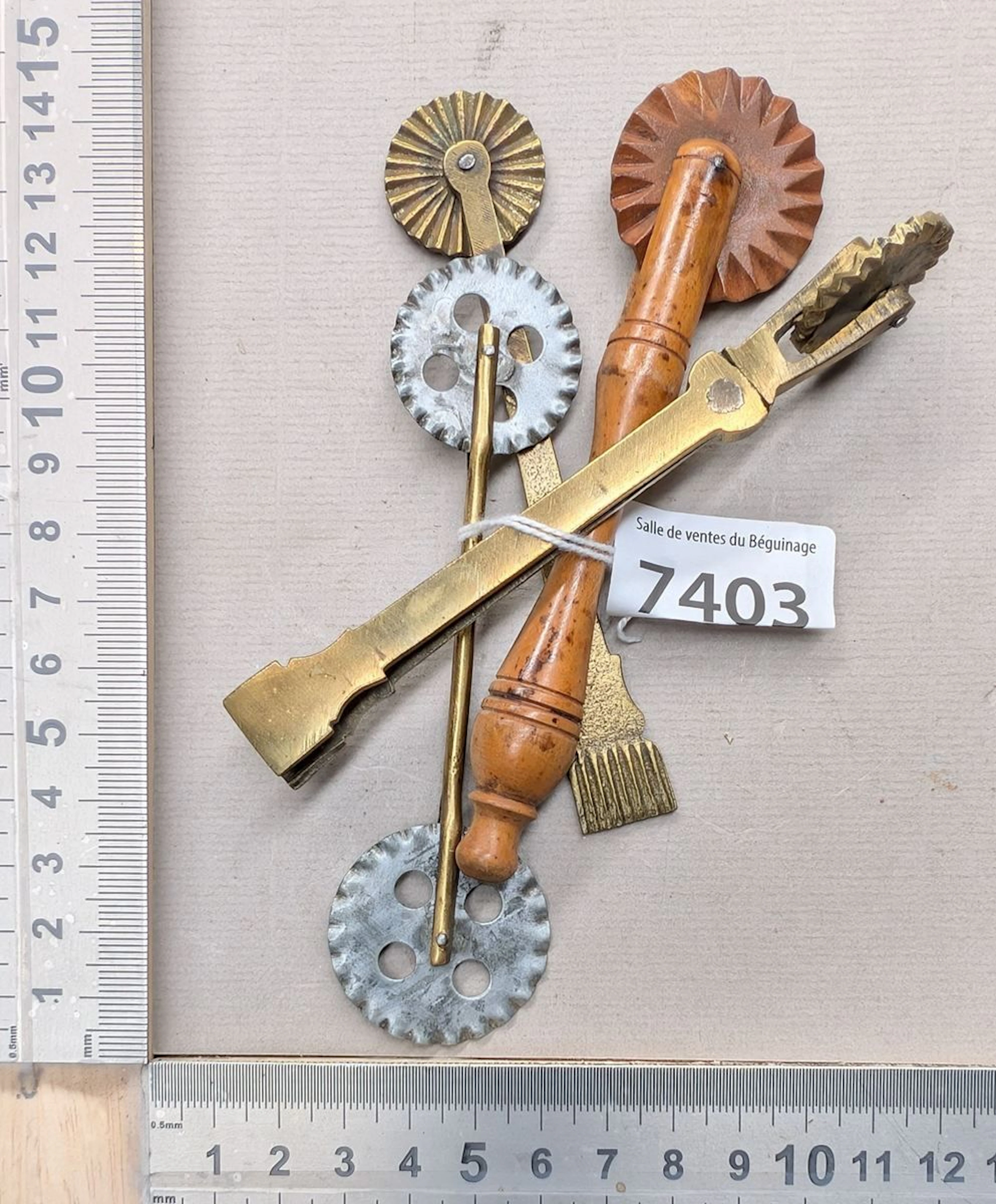 4 vintage wooden and brass dough cutters - See photos for dimensions