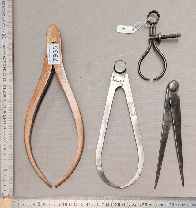 1 set of 4 different wrought-iron compasses—see photos for dimensions
