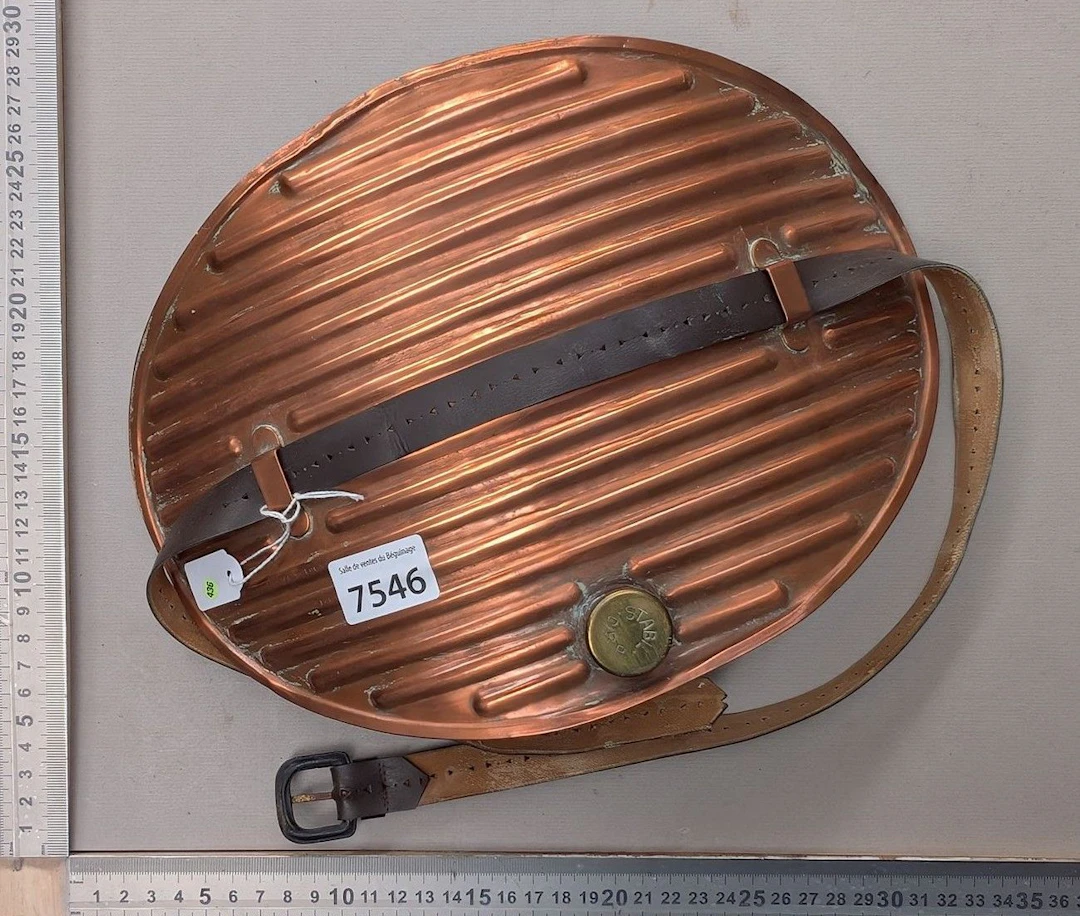 1 antique copper hot water bottle with a curved shape—see photos for
