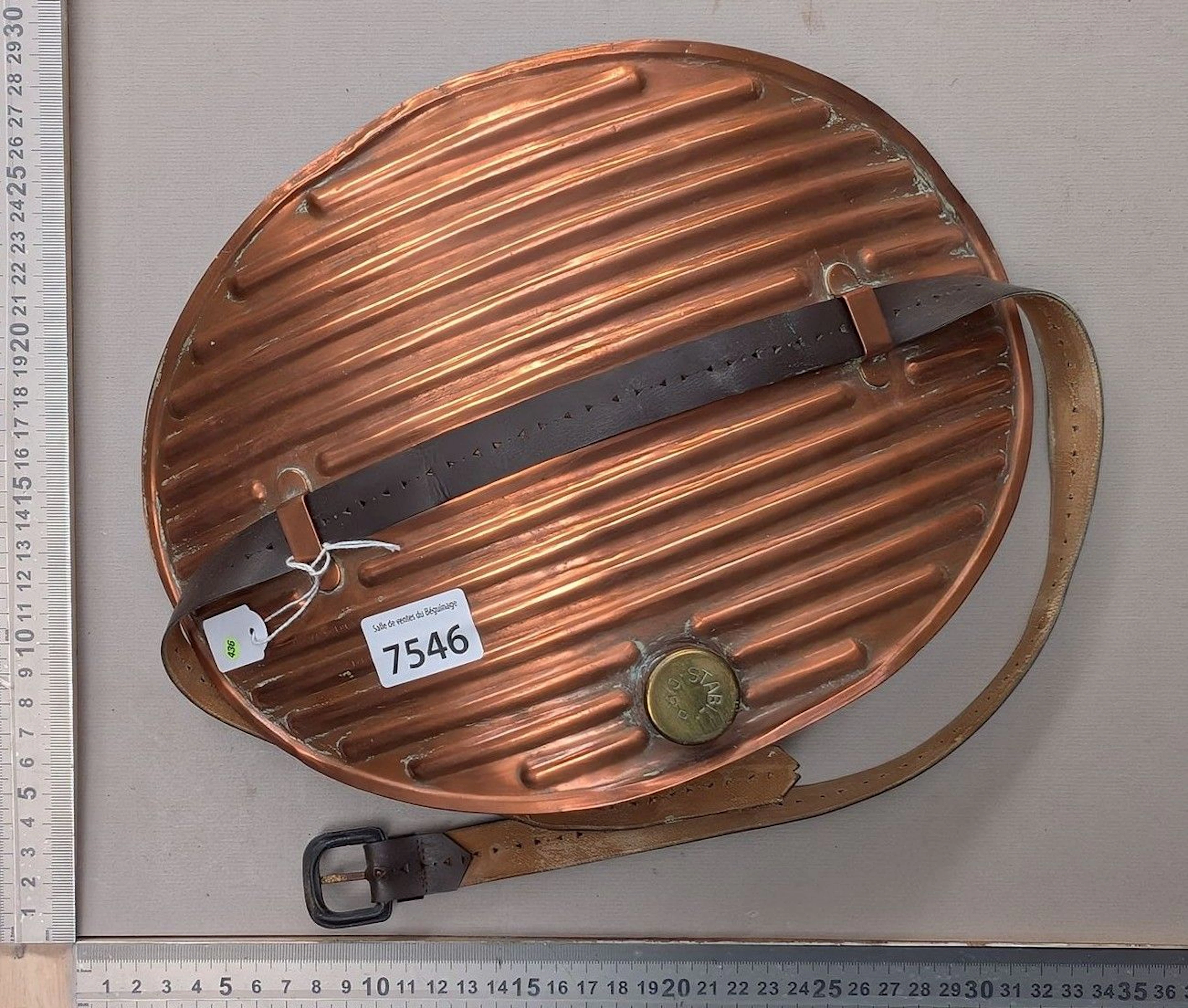 1 antique copper hot water bottle with a curved shape—see photos for