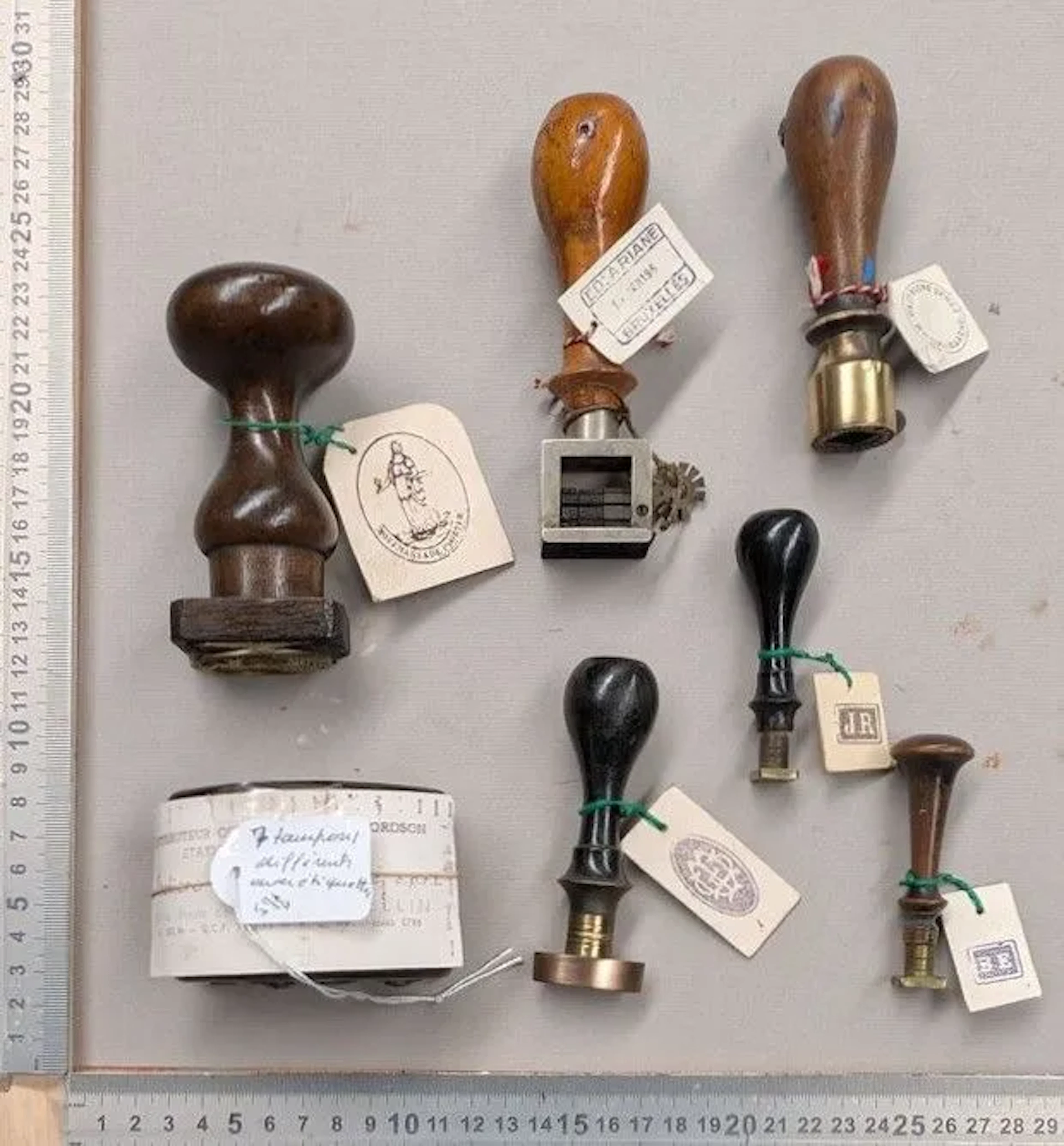 7 different vintage stamps—see photos for dimensions and condition